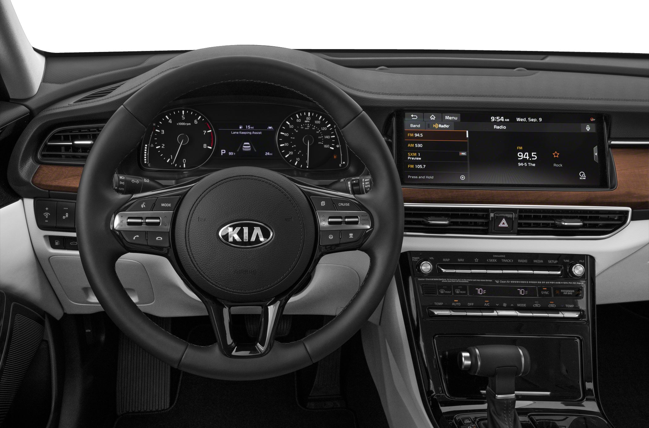 Steering wheel with controls, digital dashboard, infotainment display
