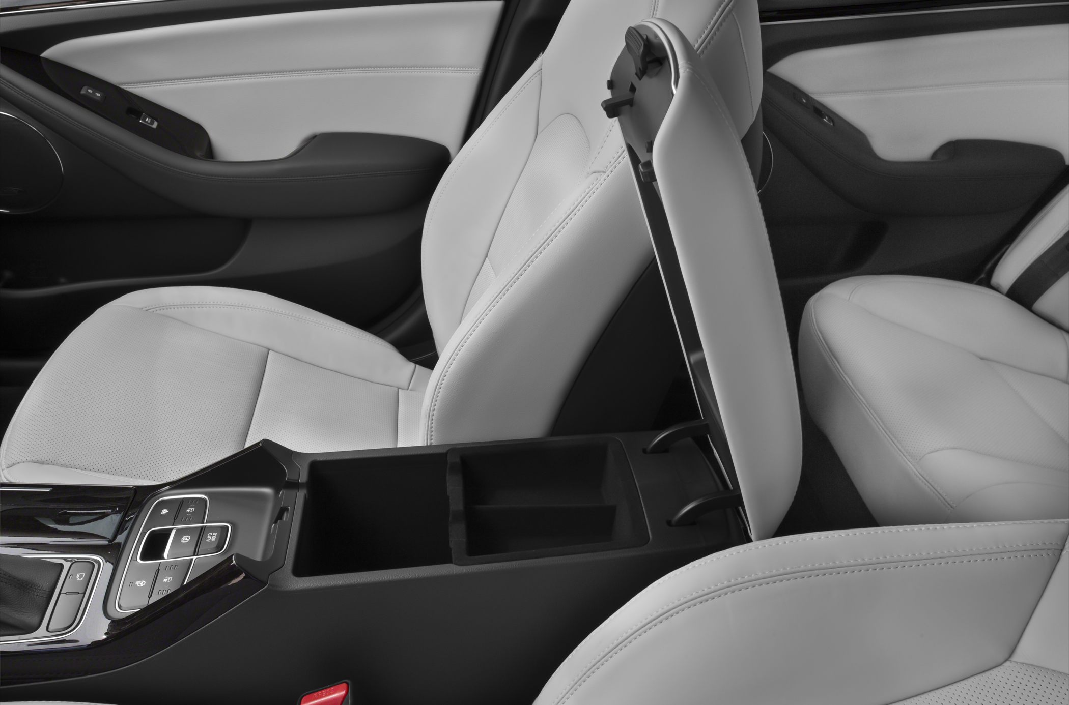 Interior center console with open storage compartment and leather seats