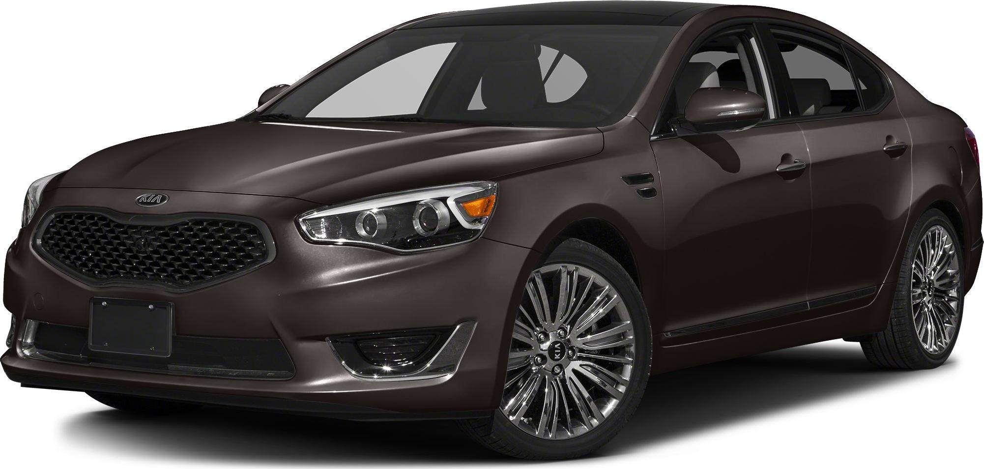 Front side view of sedan with LED headlights and multi-spoke alloy wheels