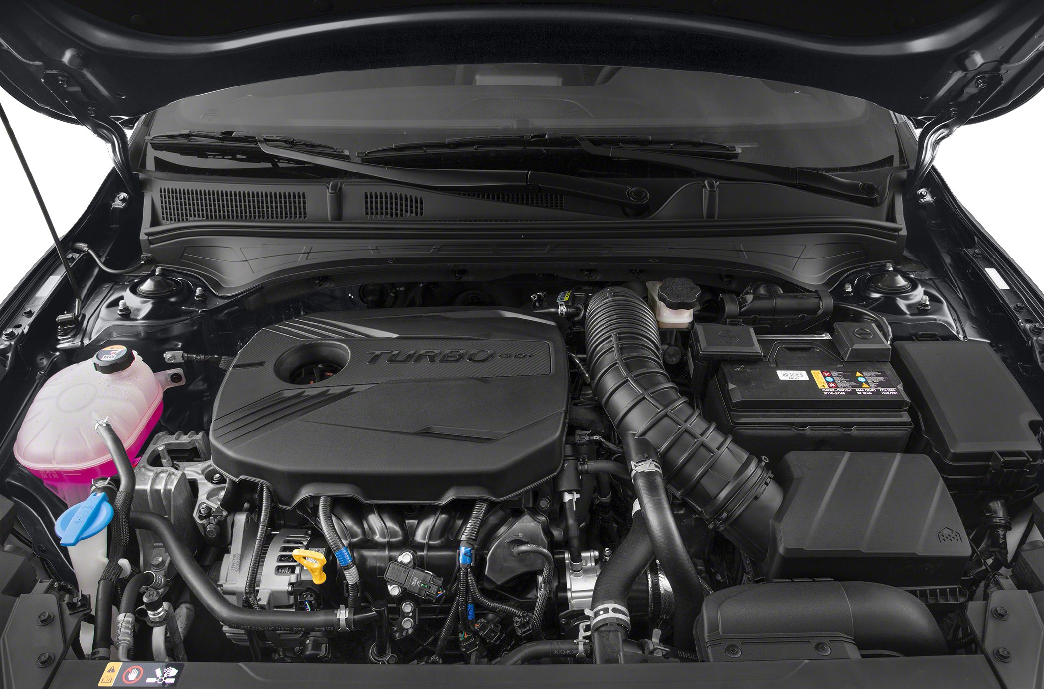 Detailed view of a turbocharged engine bay with visible intake and fluid reservoirs