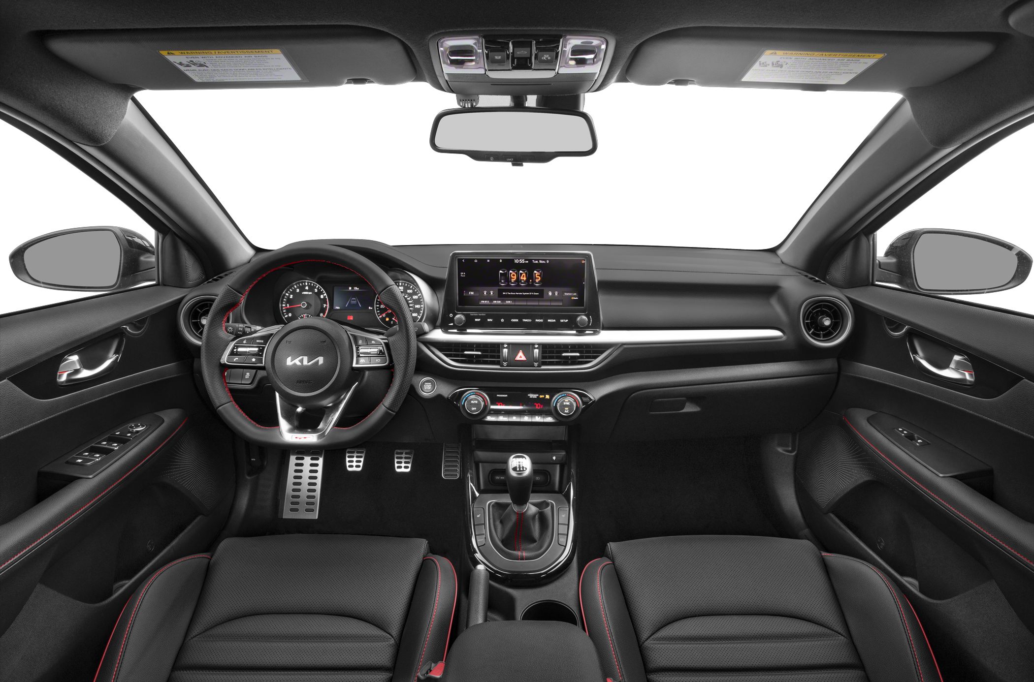 Modern car interior with dashboard, steering wheel, and manual gear shifter