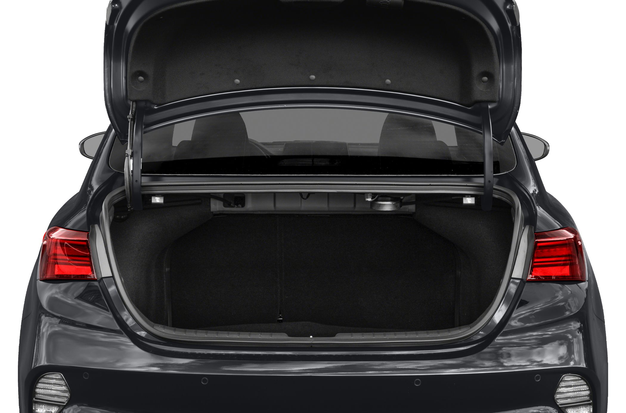 Open trunk with spacious cargo area and visible rear lights