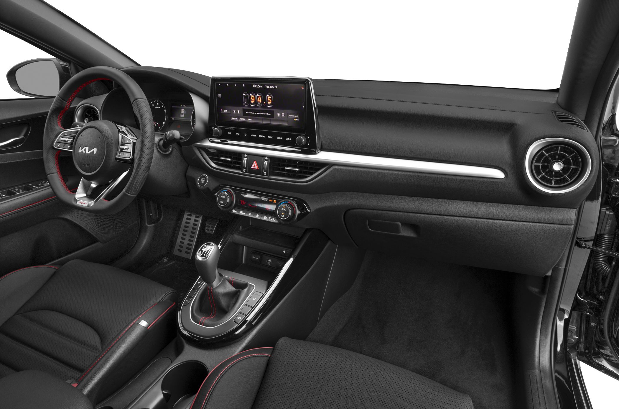 Touchscreen infotainment and manual gear shift with red stitching accents