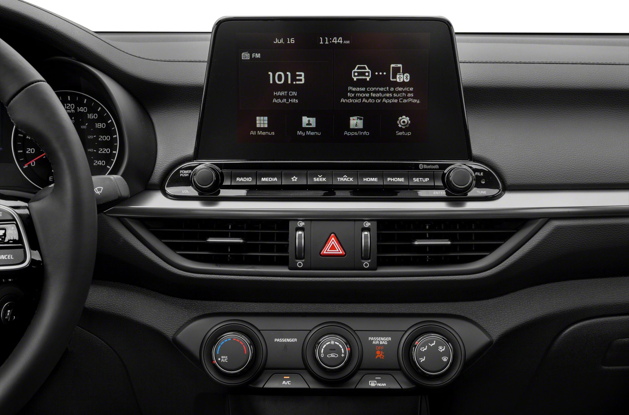 Touchscreen infotainment with media buttons and manual climate control knobs