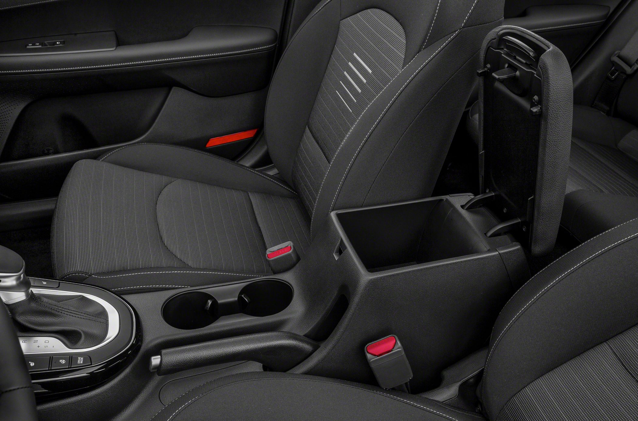 Center console storage, gear shift, and fabric front seat upholstery