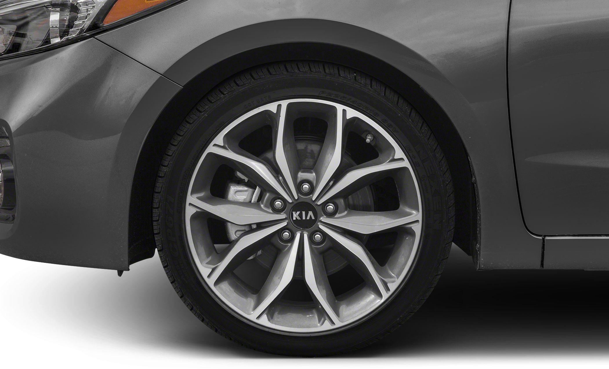 Aluminum alloy wheel close-up with tire and brake components