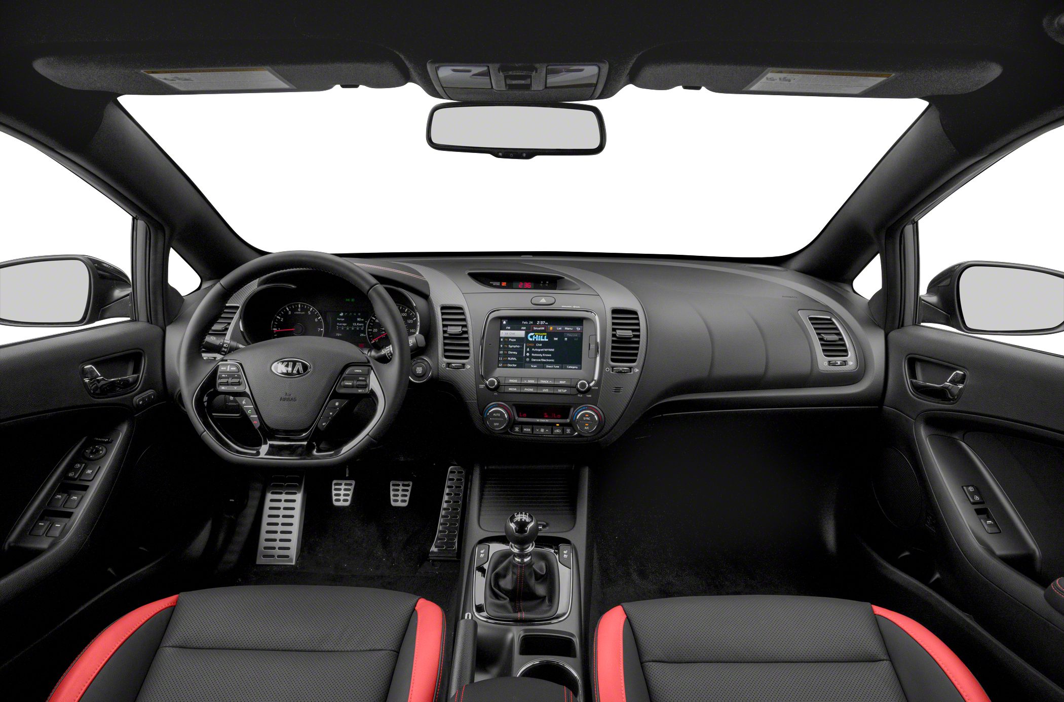 Manual transmission and touchscreen infotainment in black-red compact car interior.