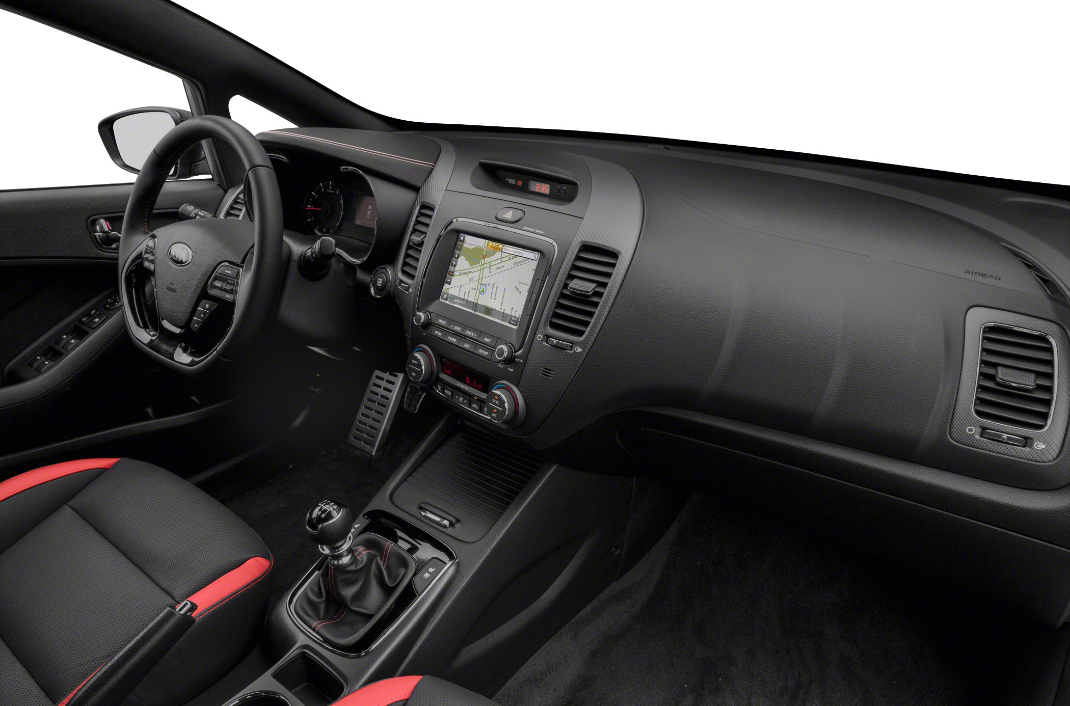 Interior with manual transmission, navigation screen, and red-accented sporty seats