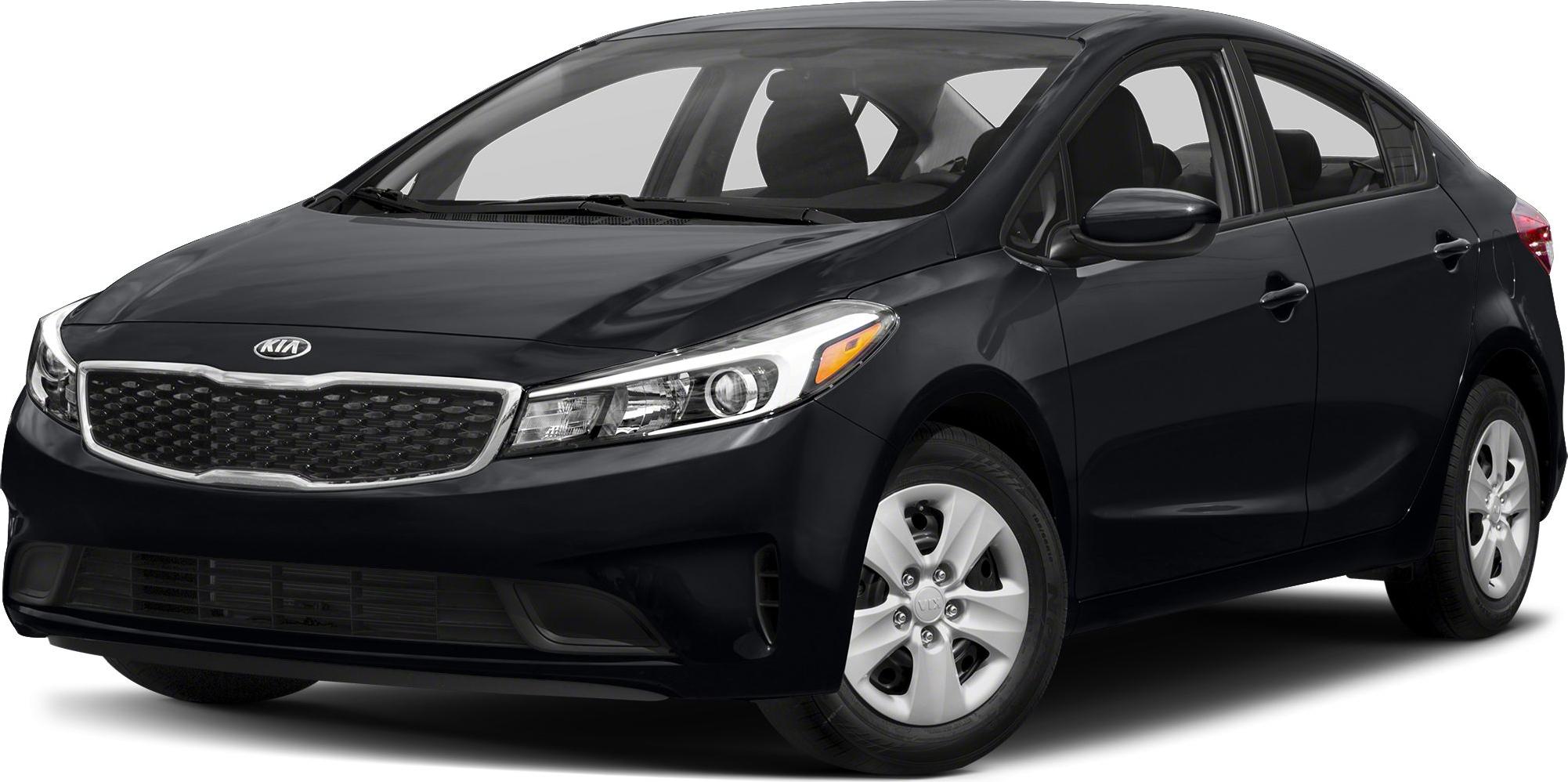 Front-side view of compact hatchback with modern headlights and distinctive grille