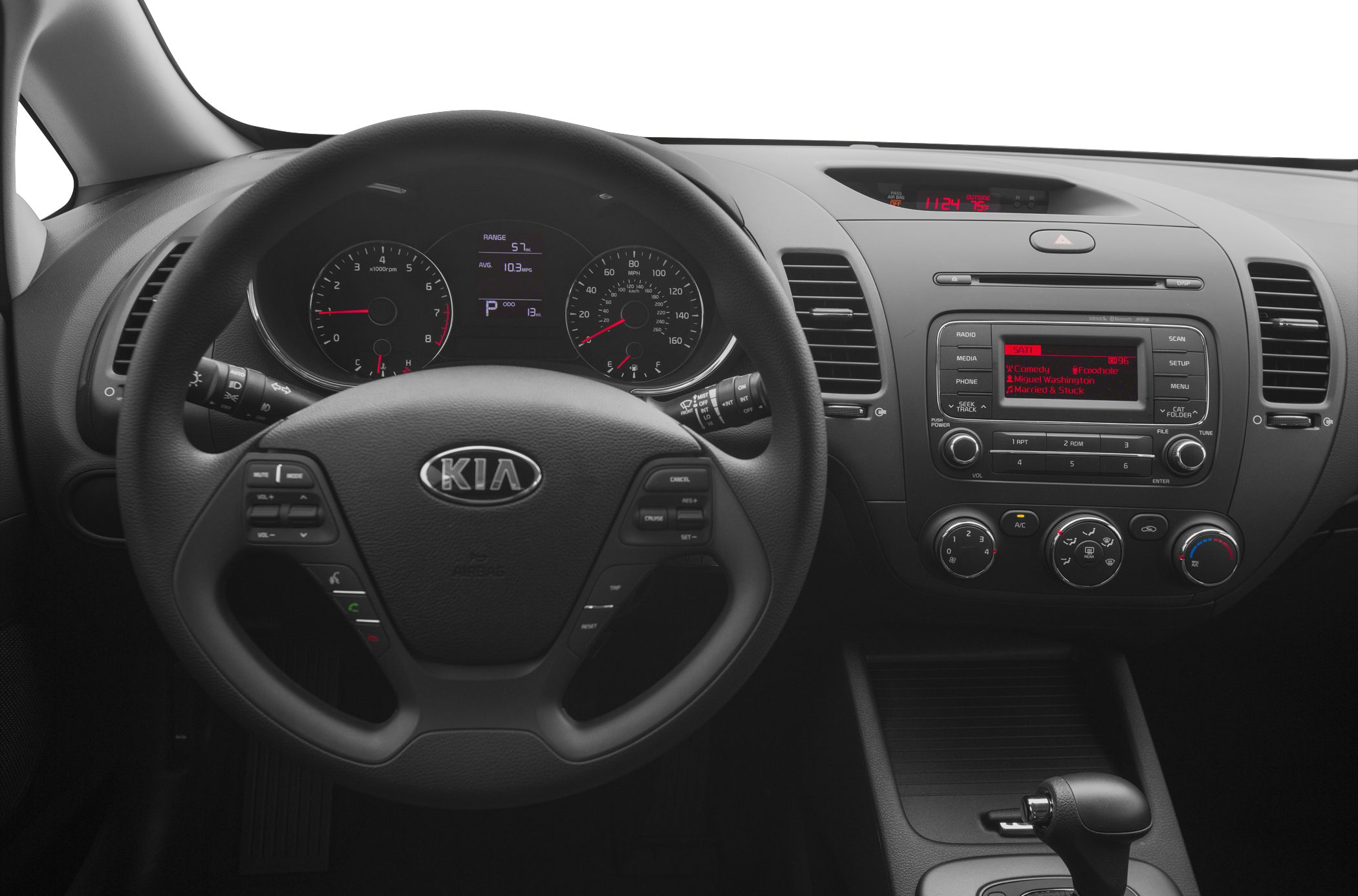 Steering wheel, instrument cluster, and center dashboard console.