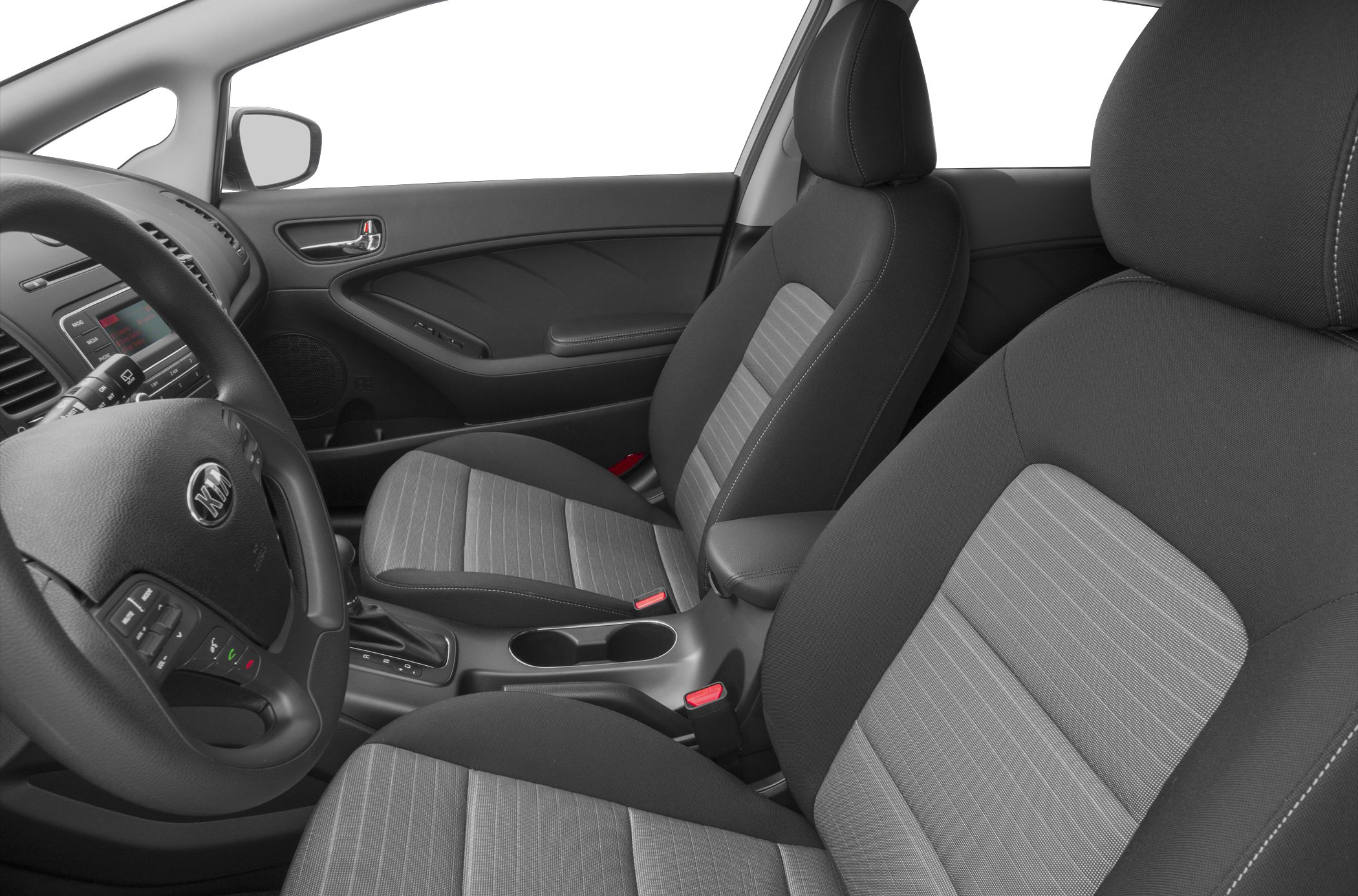 Driver and passenger seats with steering wheel and center console