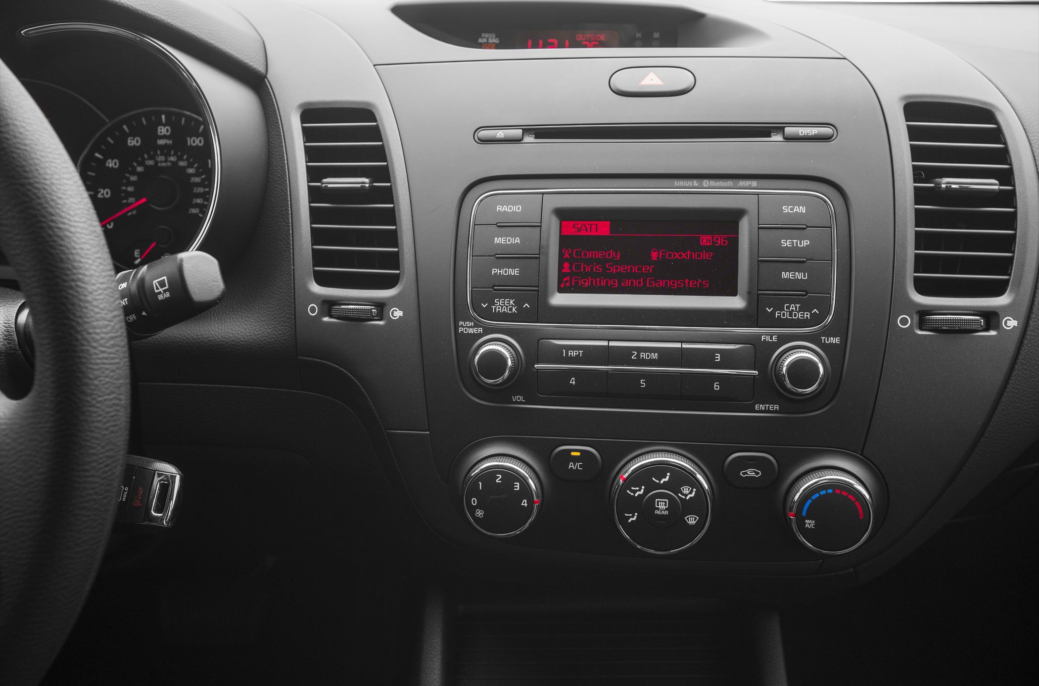 Car dashboard with stereo system and air conditioning controls