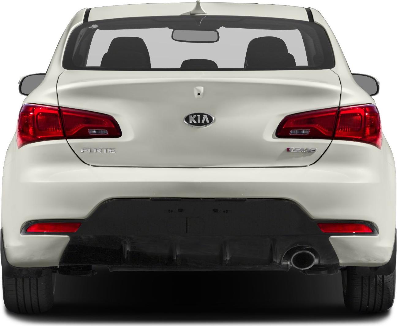 Rear view showcasing taillights, bumper, and exhaust of a white coupe.