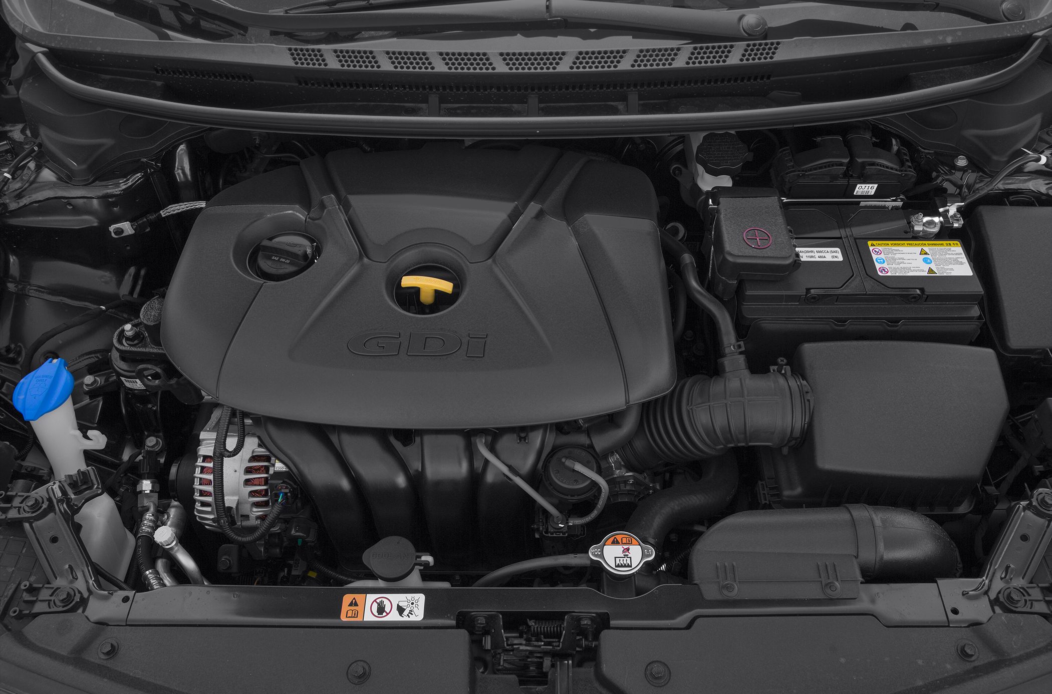 Engine bay showing GDi engine cover and battery compartment