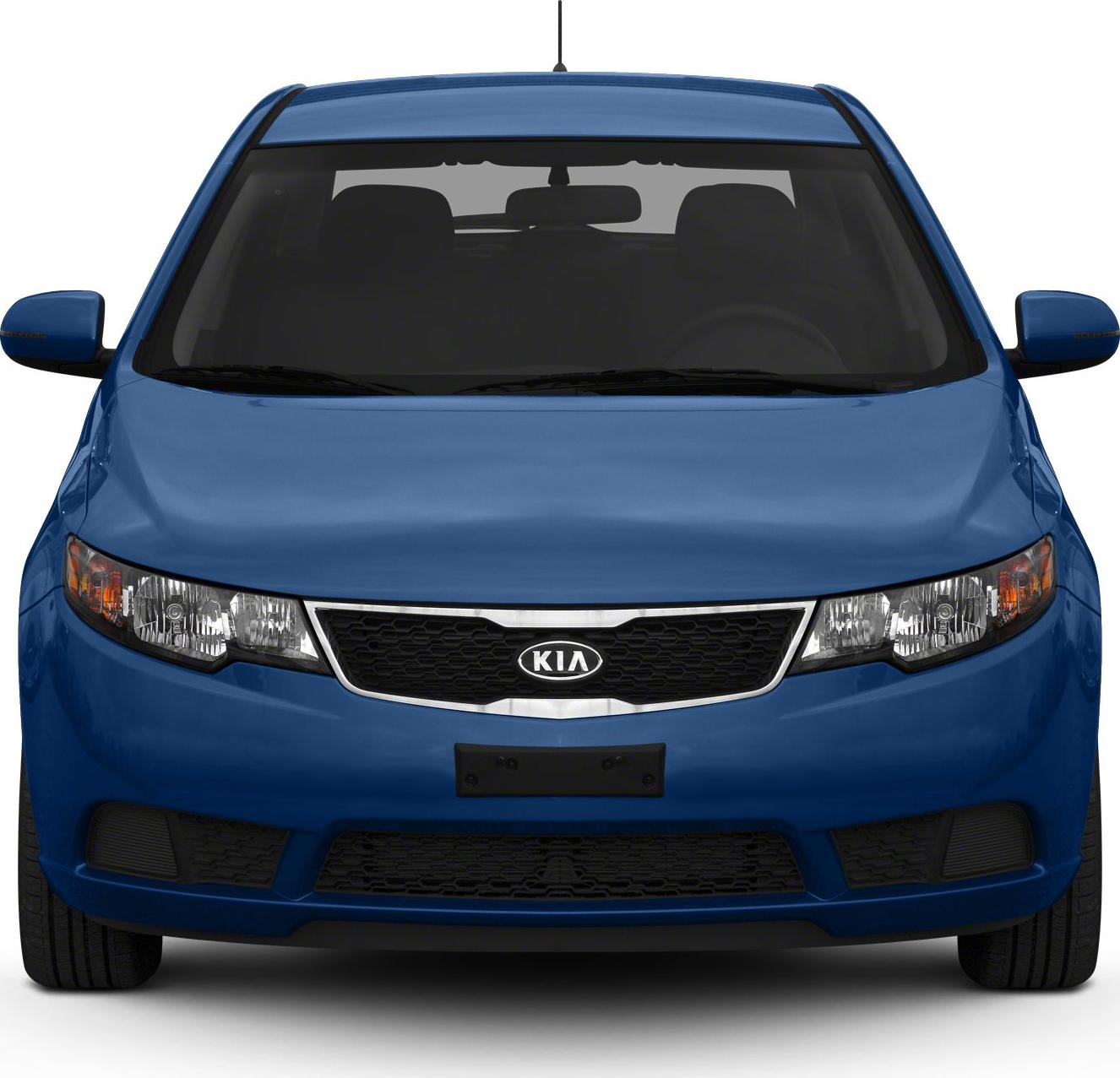 Close-up of car front grille and dual headlights