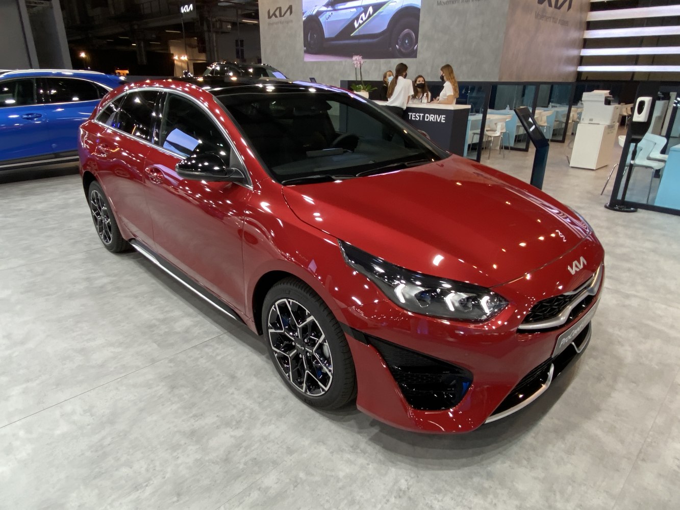 Red hatchback with LED headlights and sporty alloy wheels