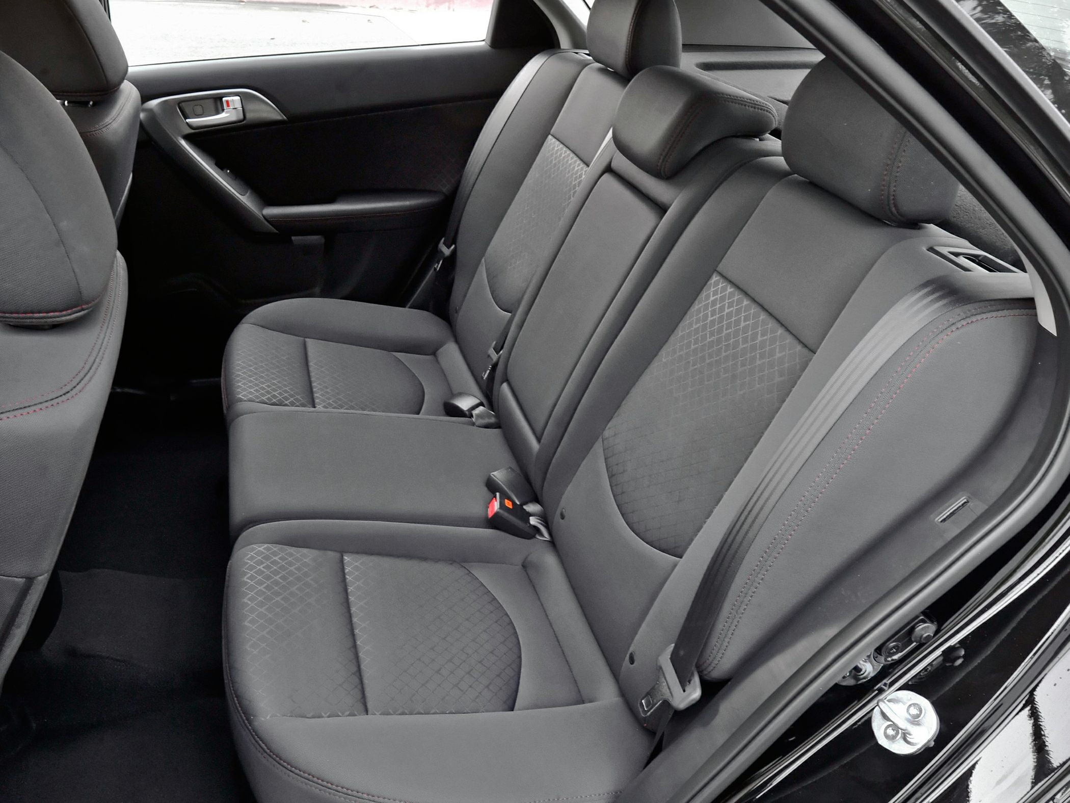 Rear seat interior with fabric upholstery and headrests