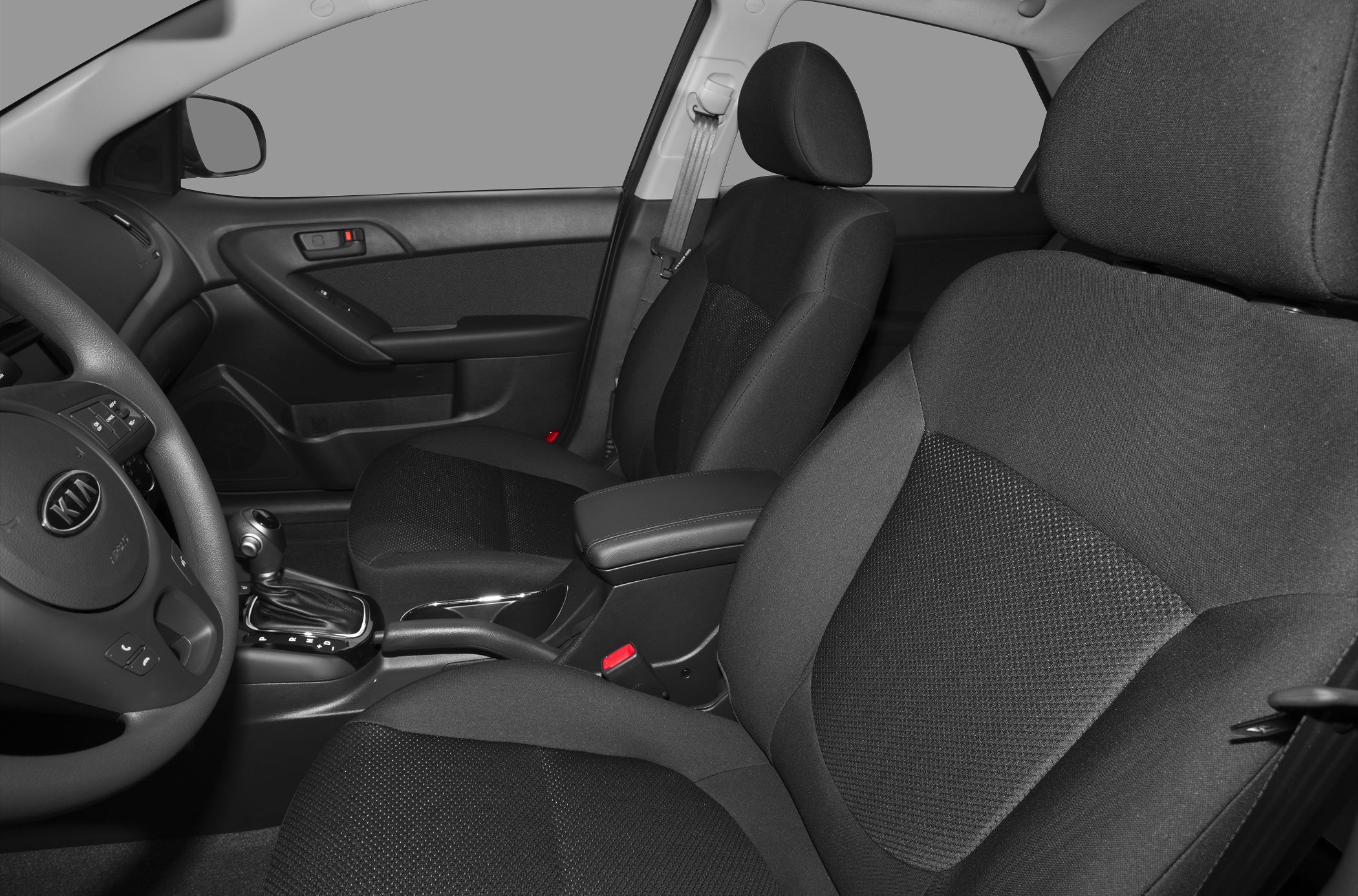 Front seats and dashboard interior with black fabric upholstery