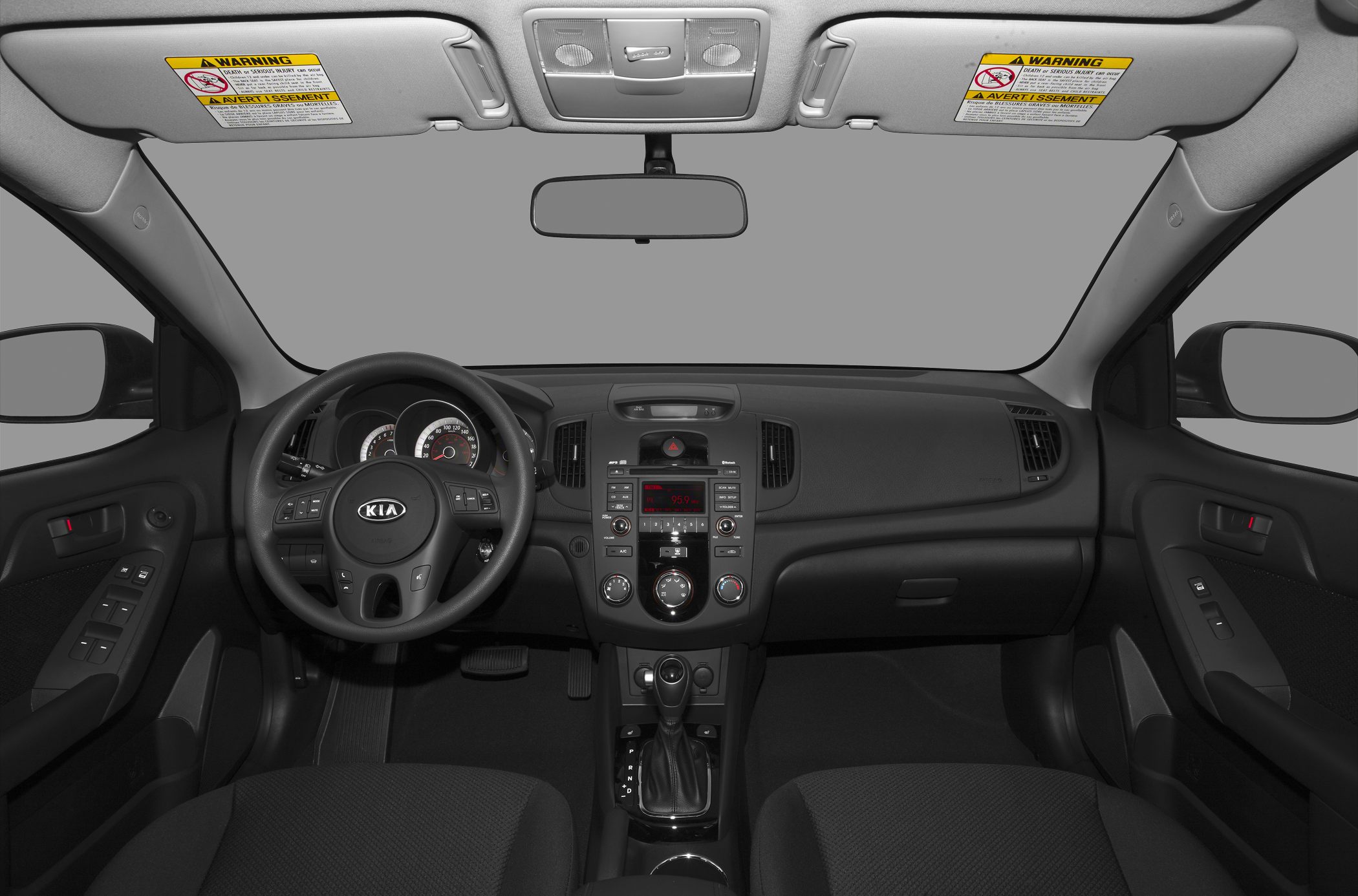 Dashboard, steering wheel, center console with gear shift and control buttons