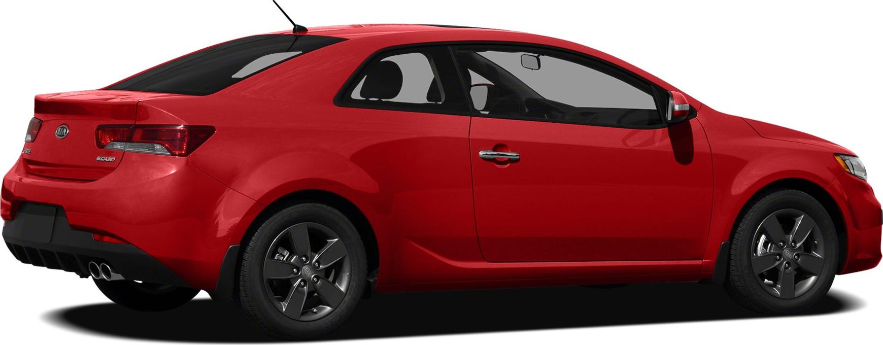 Side view of red two-door coupe with dual exhaust and dark alloy wheels