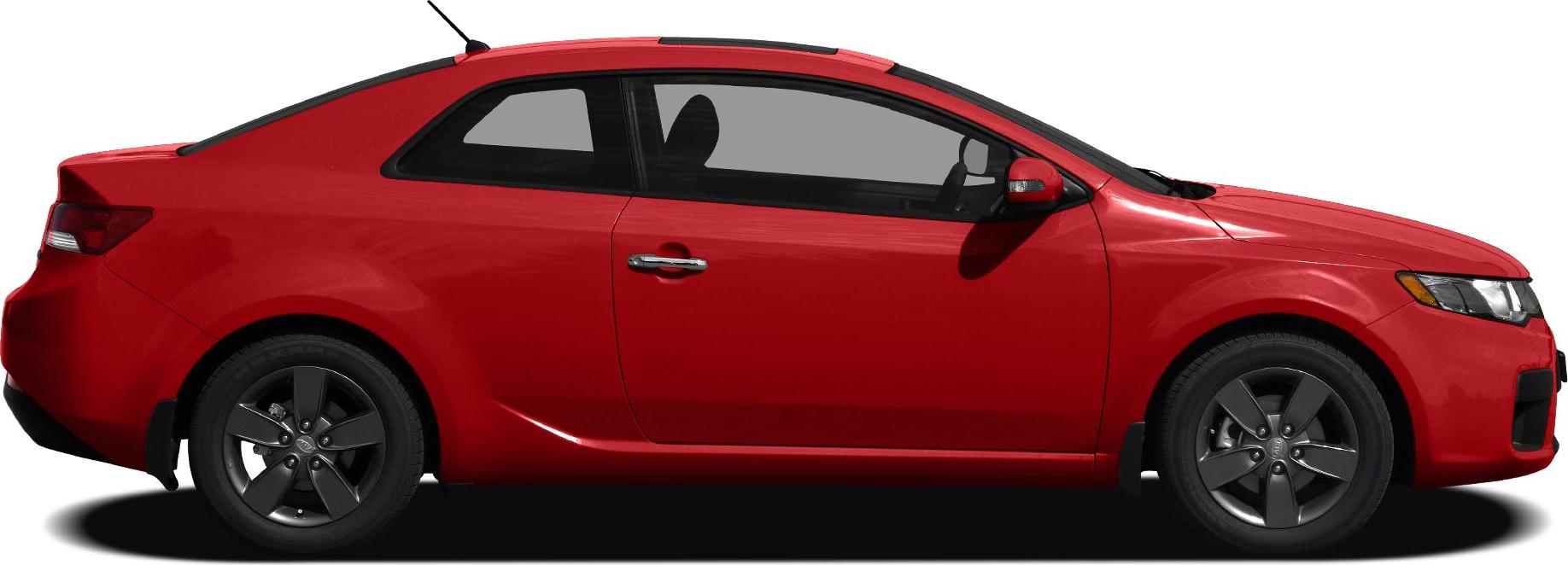 Side profile of red two-door coupe with alloy wheels.