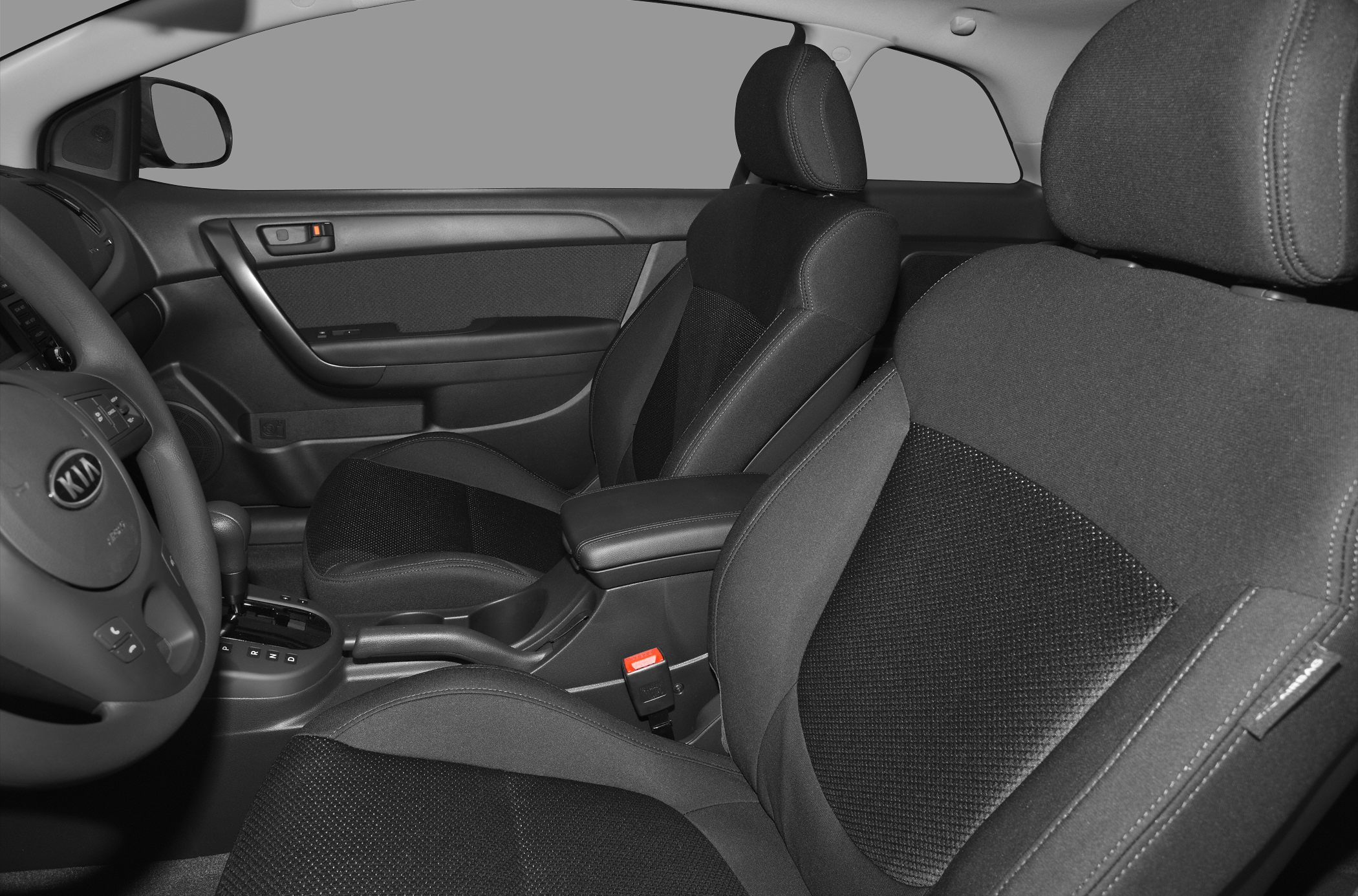 Front cloth seats with door panel and center console details