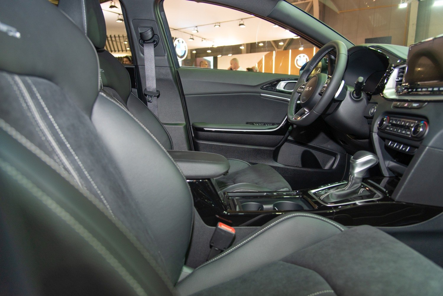 Modern interior with dashboard, steering wheel, and front seats