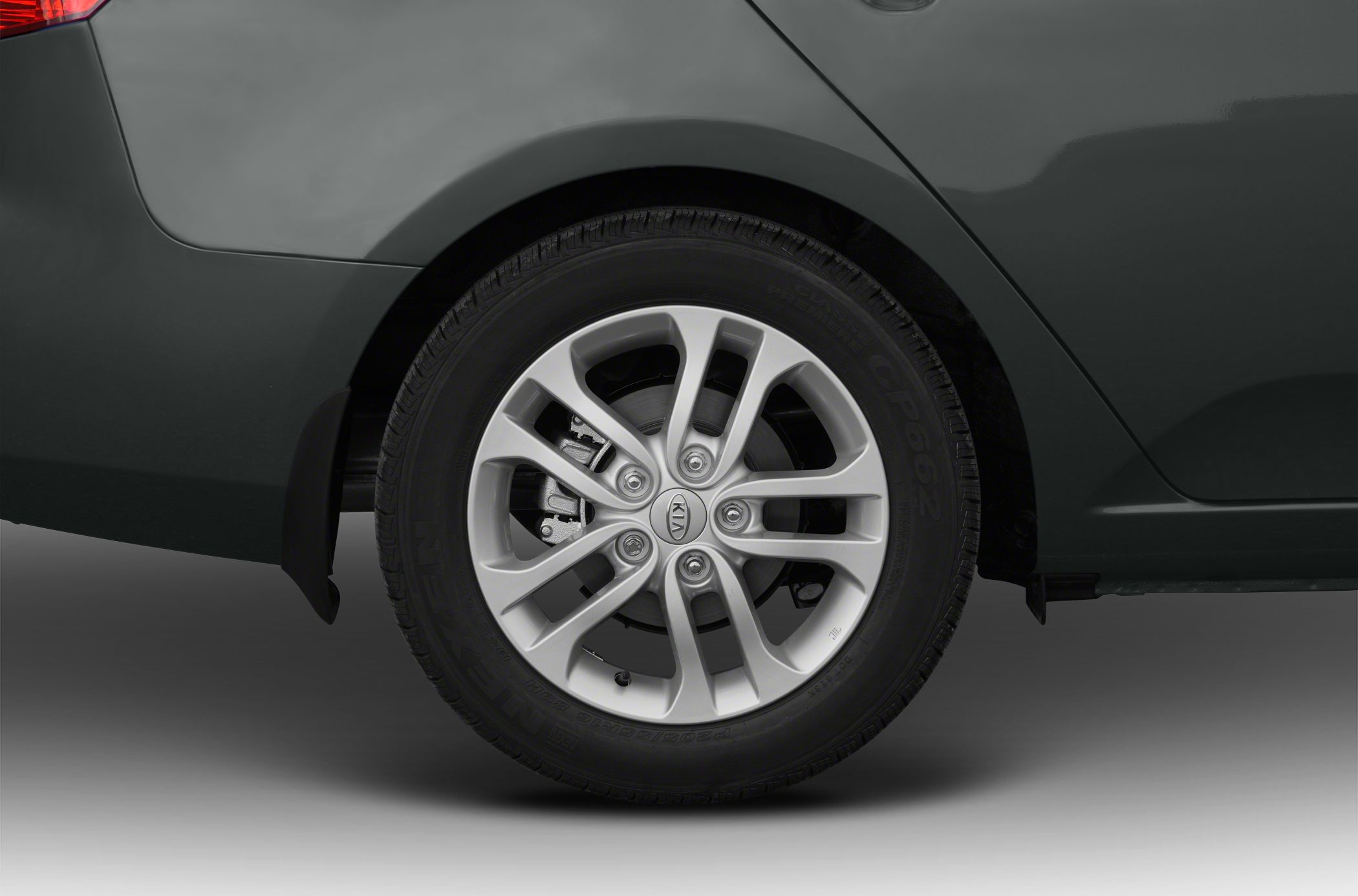 Close-up of alloy wheel with tire and brake caliper