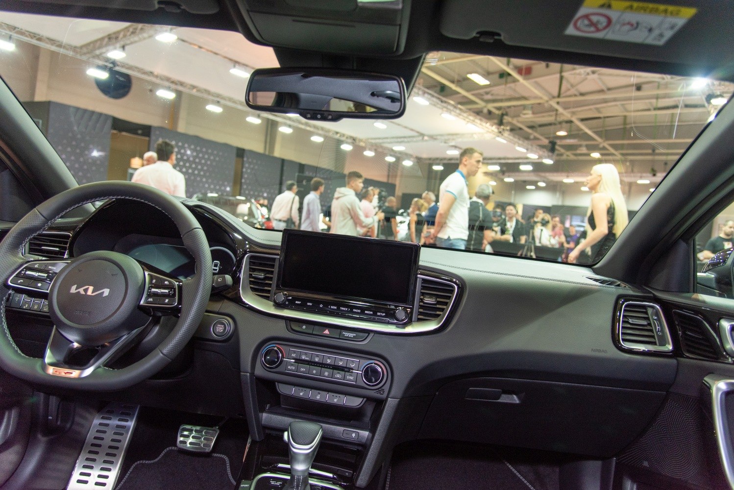 Dashboard and steering wheel with touchscreen and controls