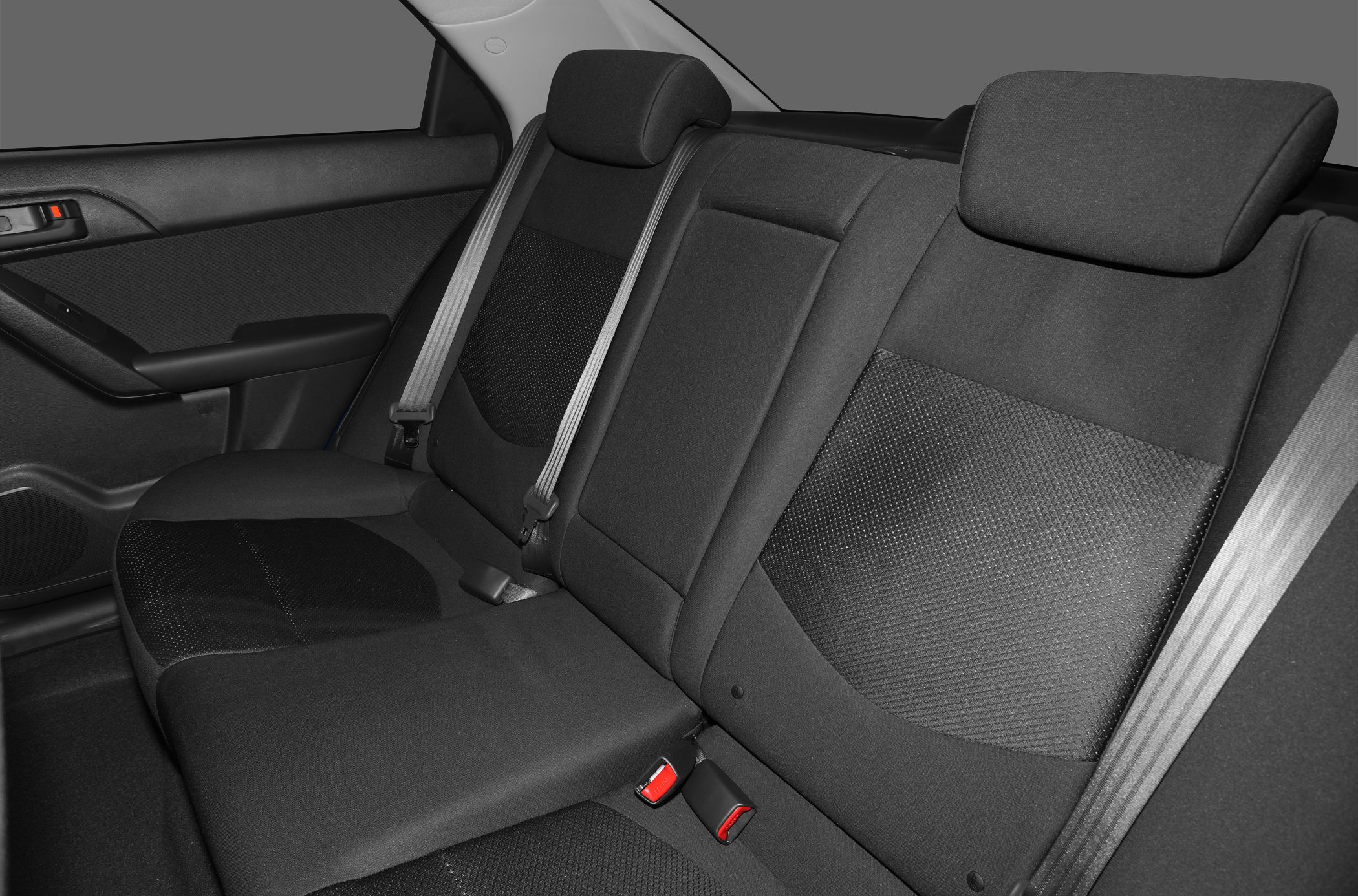 Fabric rear seats with headrests and seat belts