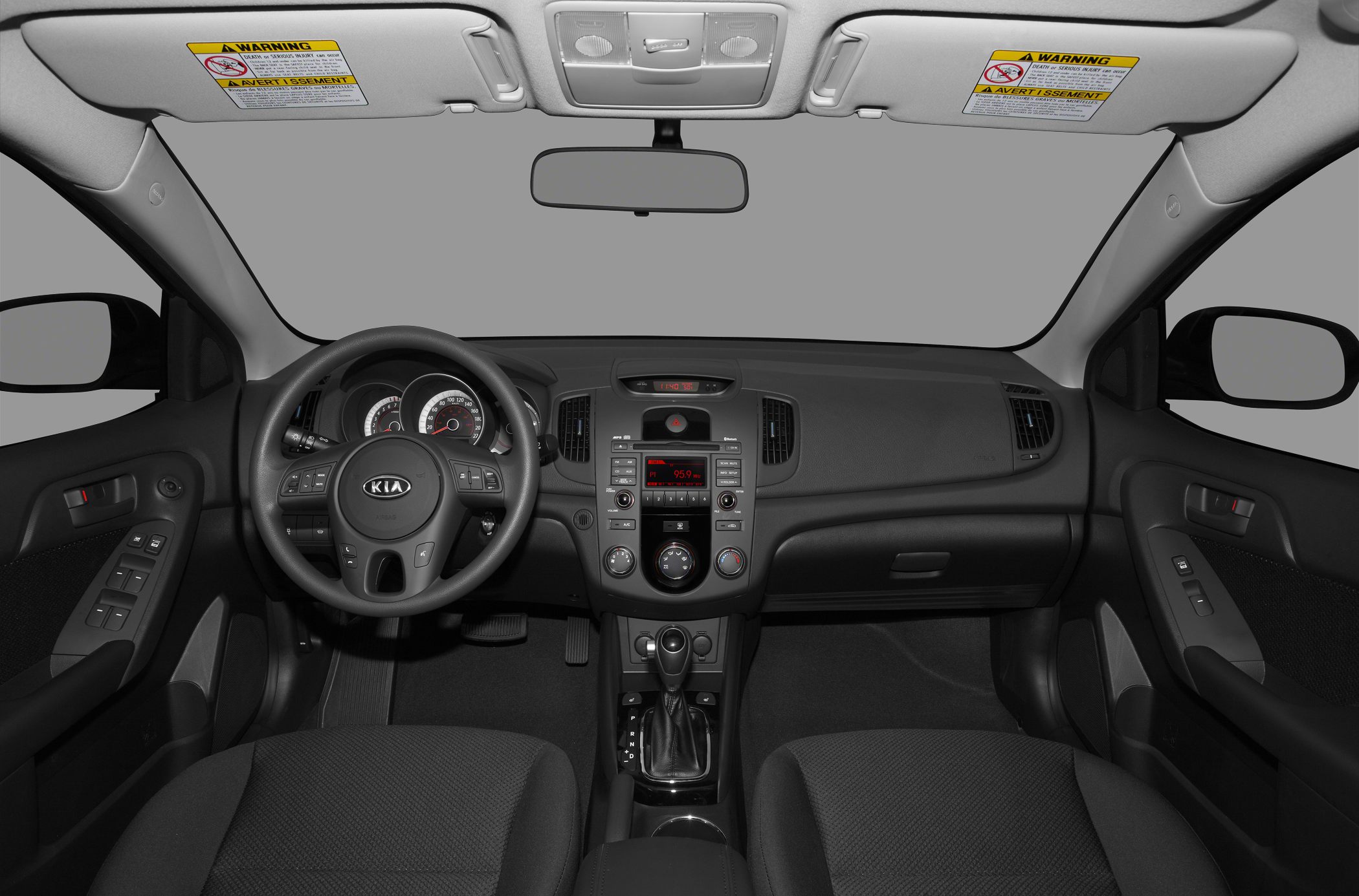 Interior dashboard and steering wheel with controls and automatic gear shift