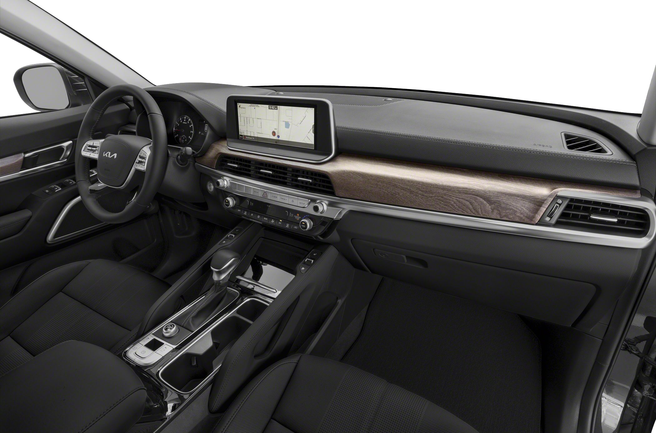 Modern dashboard with navigation screen and wood trim in car interior