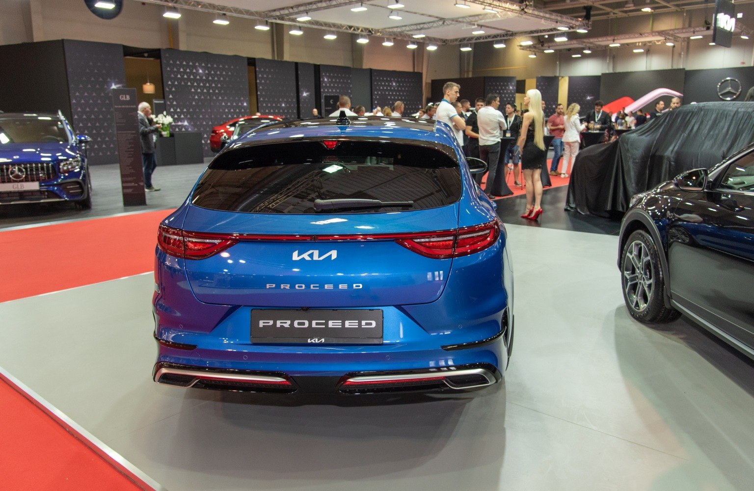 Blue hatchback rear with full LED tail light and dual exhaust tips
