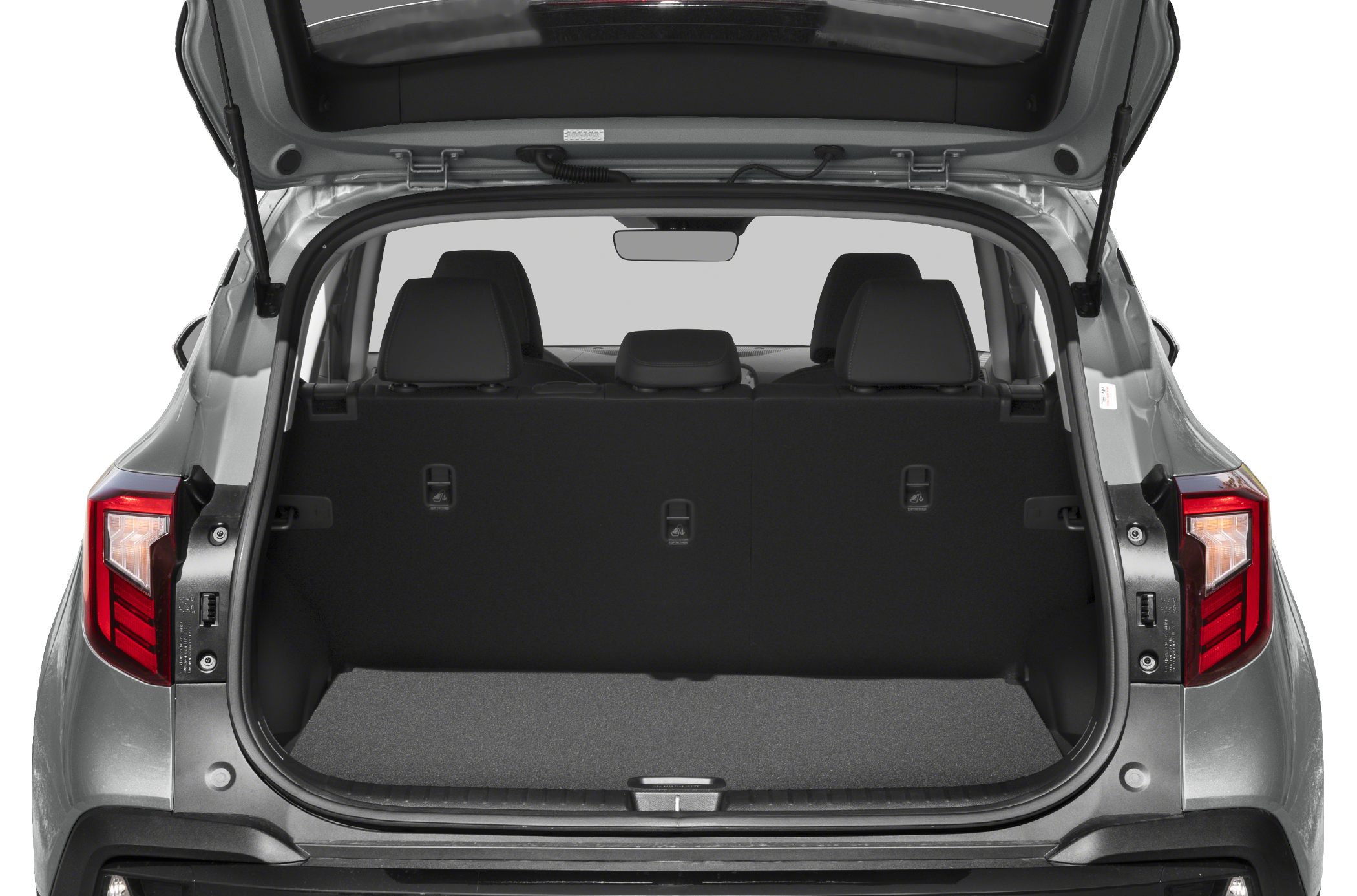 Open rear cargo space with trunk floor and rear seats visible