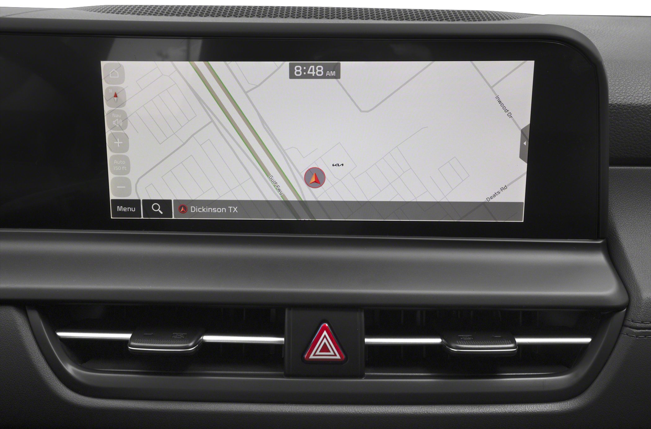 Car navigation system display with dashboard air vents and hazard light button