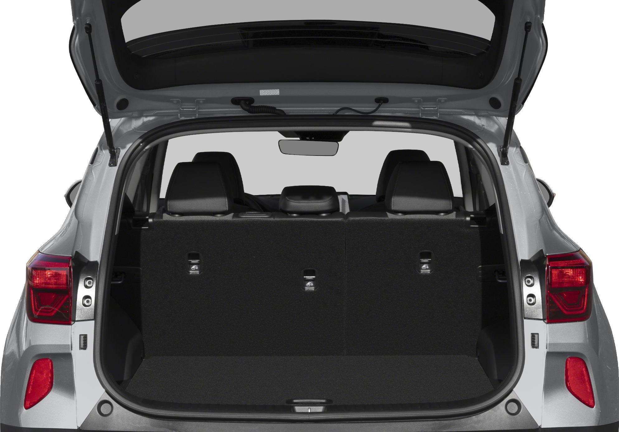 Open trunk with folded rear seats and spacious cargo area