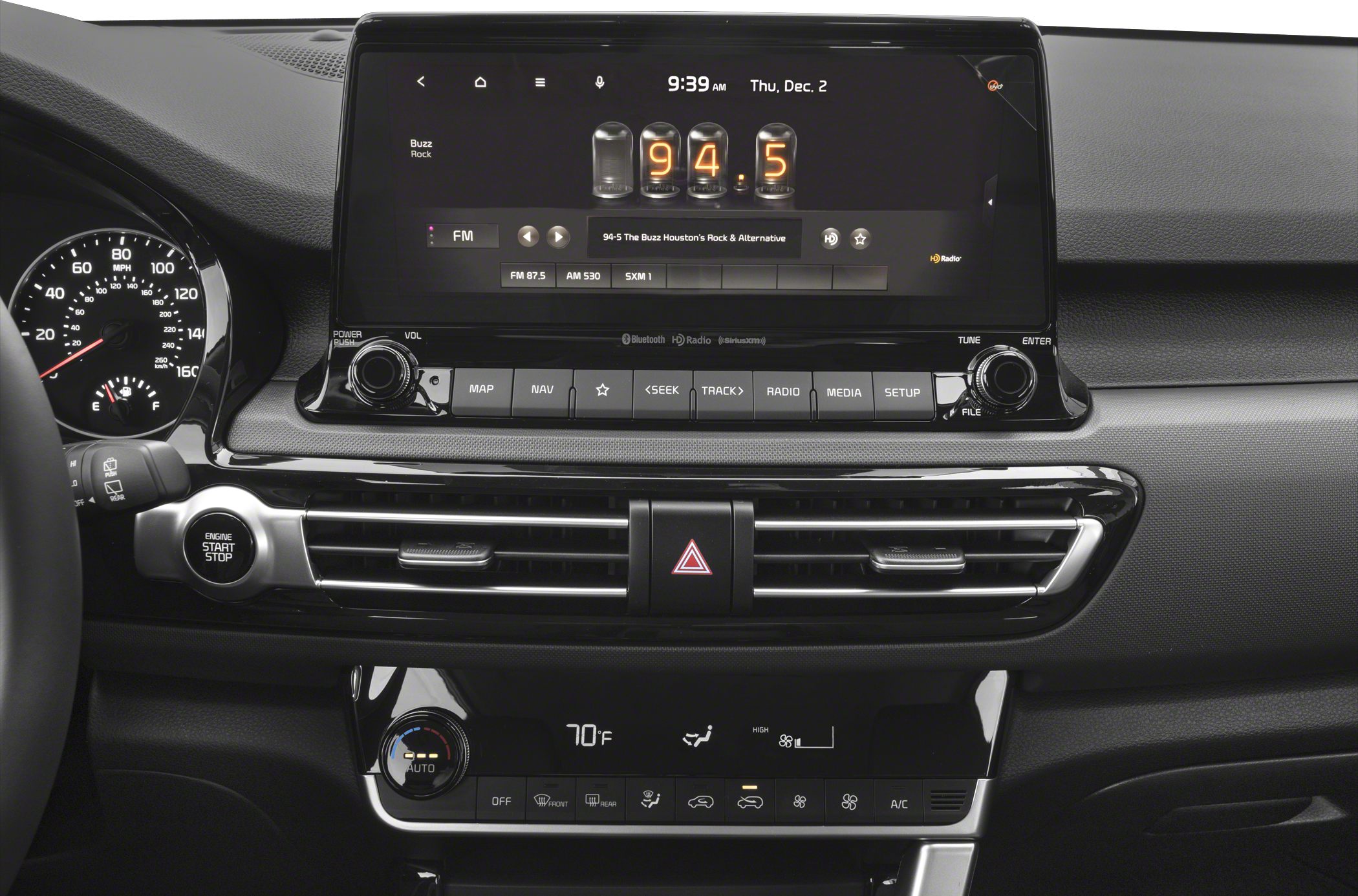 Central touchscreen display and digital climate control panel in vehicle dashboard