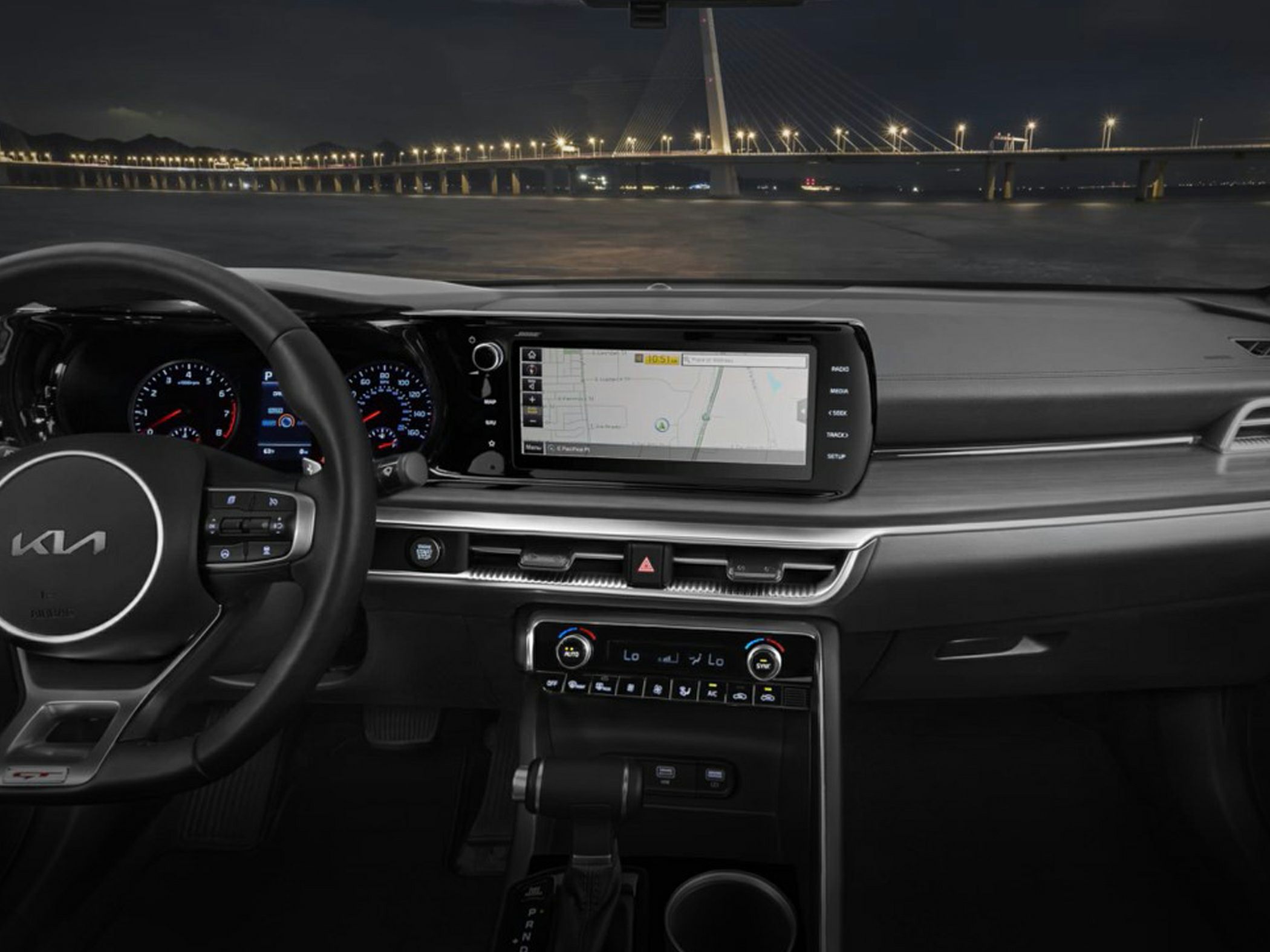 Digital instrument cluster and touchscreen infotainment system inside modern car