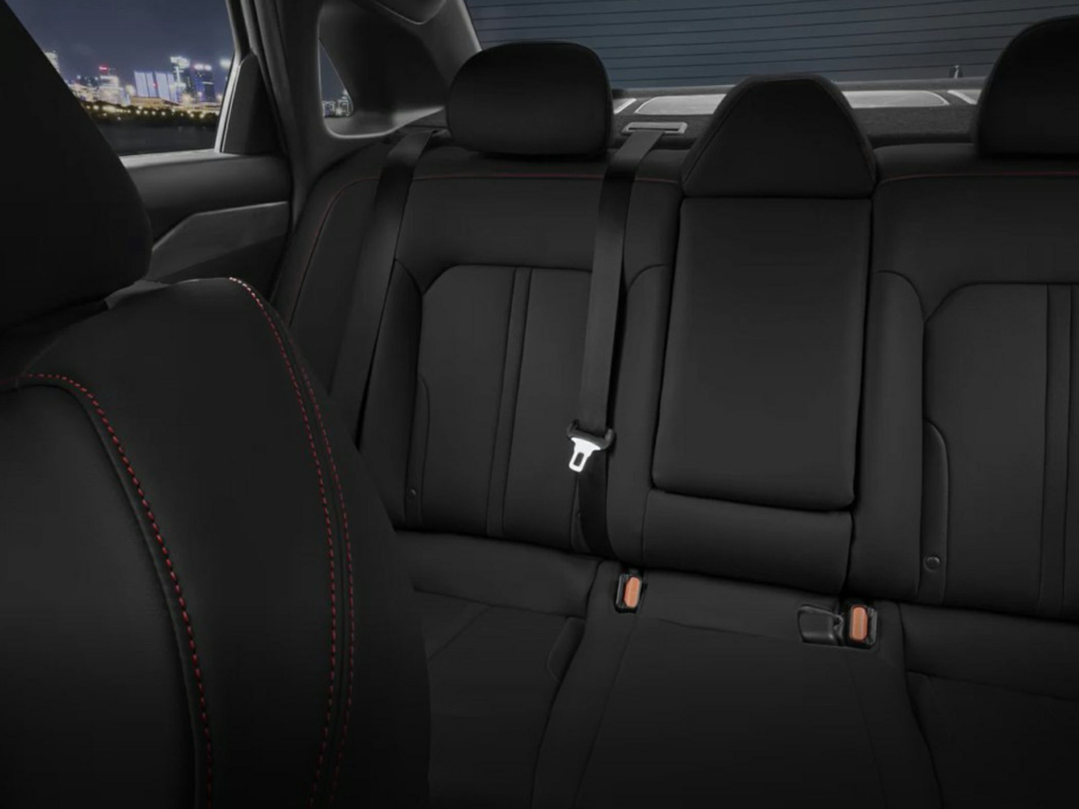 Black leather rear seats with red contrast stitching