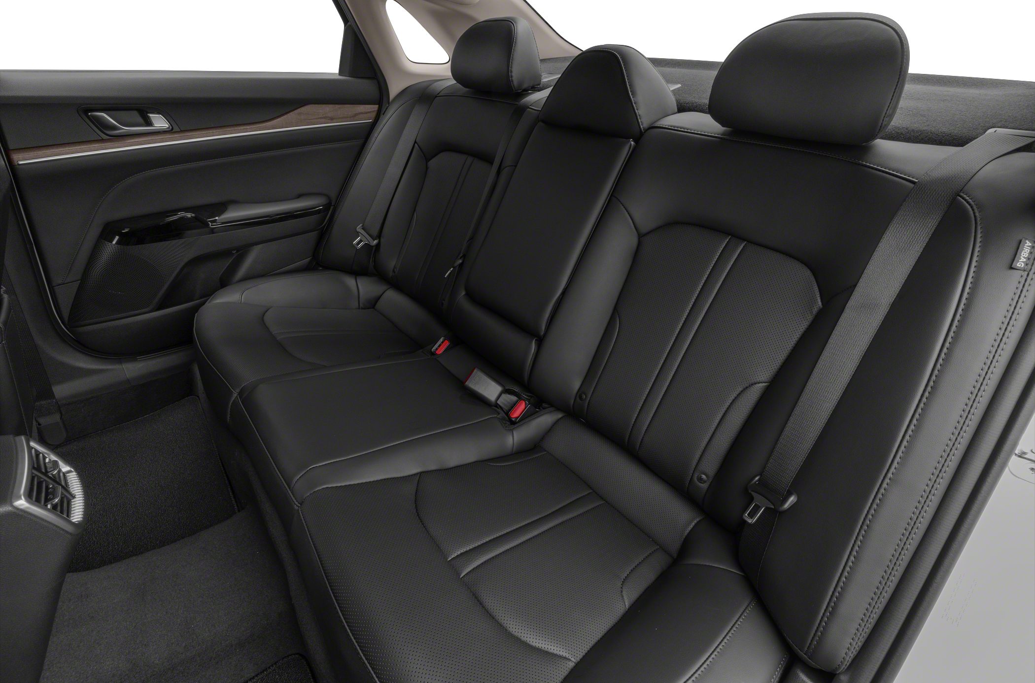Black leather rear seats with detailed stitching and headrests