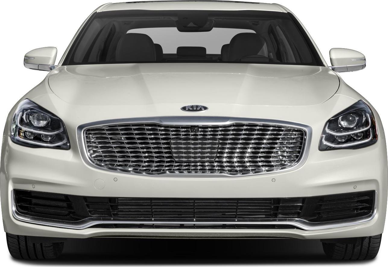 Front view of luxury sedan with chrome grille and LED headlights