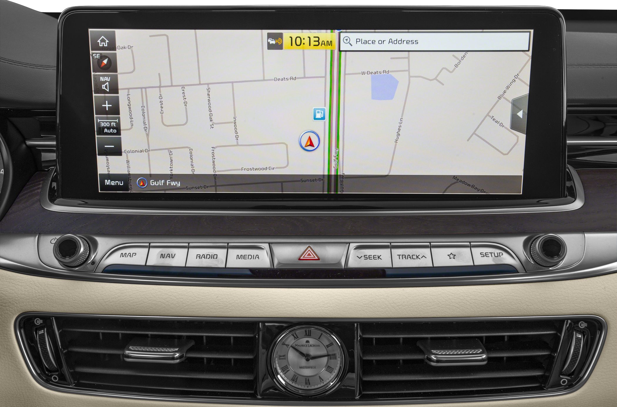 Wide touchscreen navigation system with analog clock and media control buttons