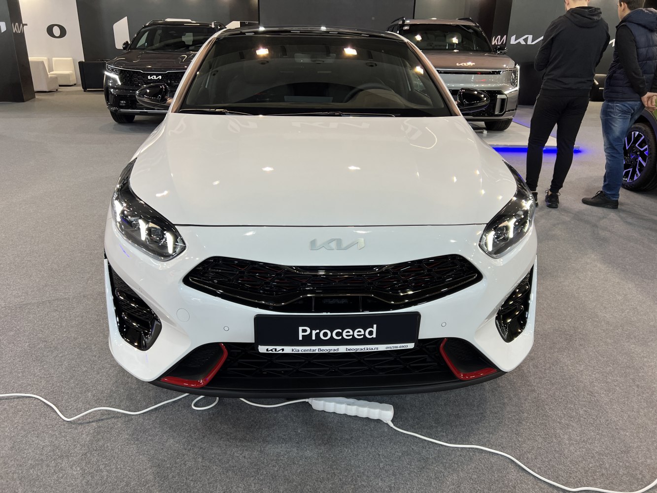 Front view with LED headlights and sporty black grille