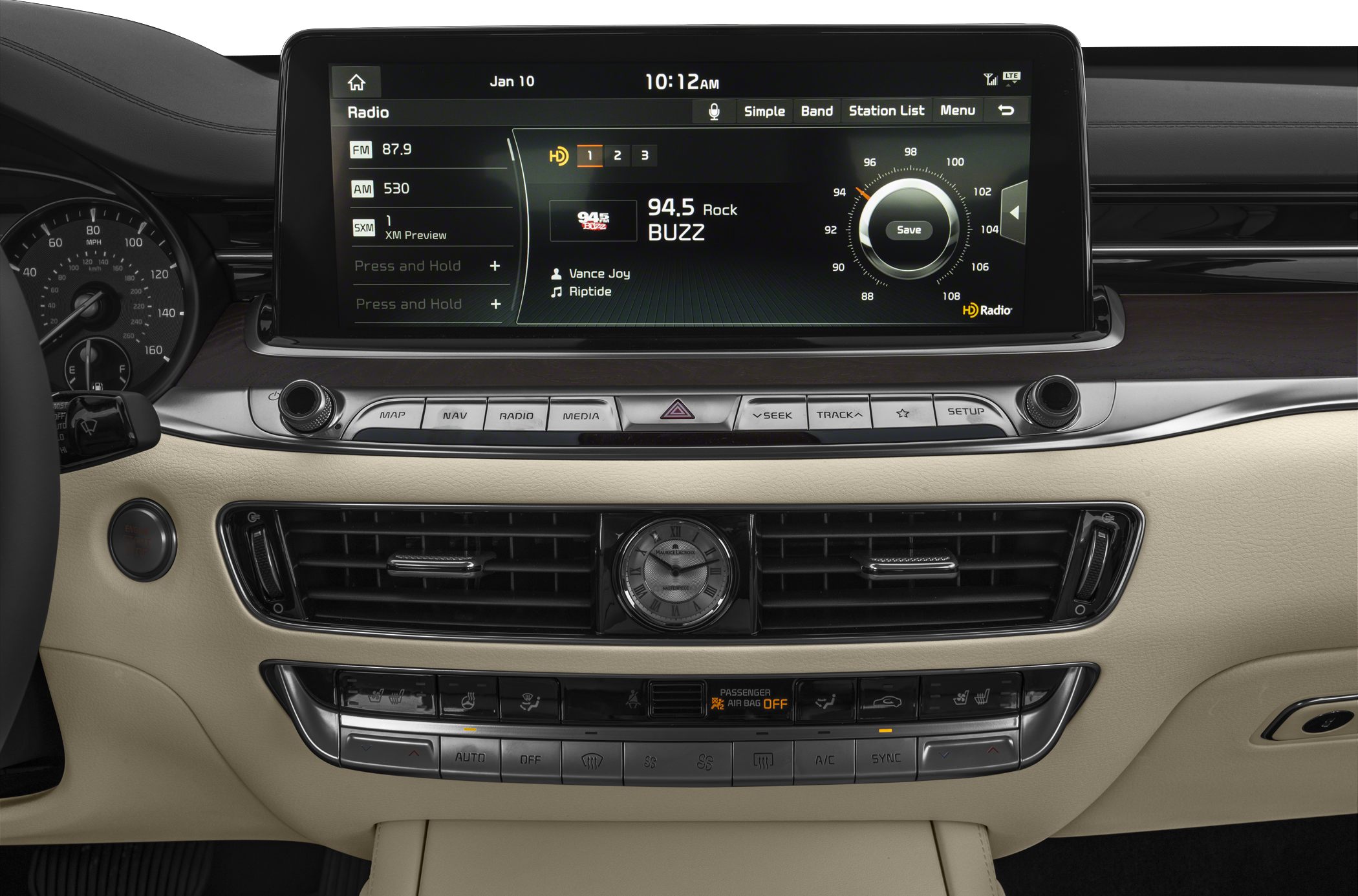 Dashboard with infotainment touchscreen and analog clock