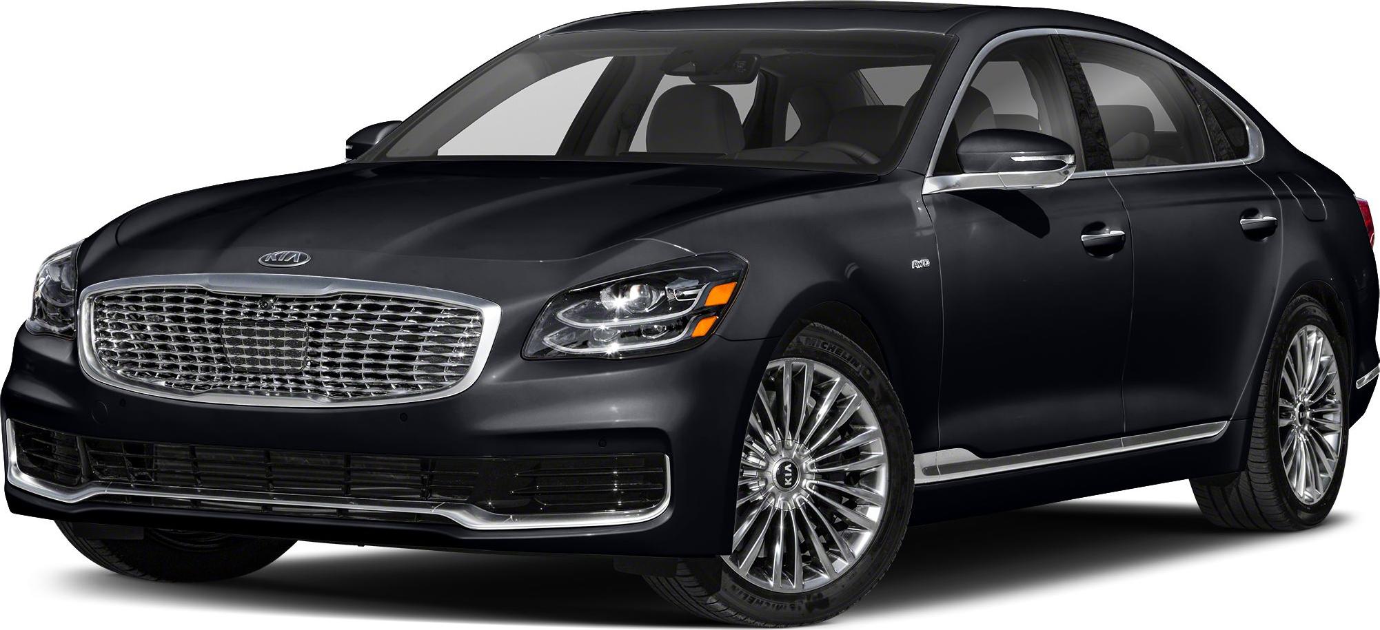 Luxury sedan front with chrome grille and multi-spoke alloy wheels