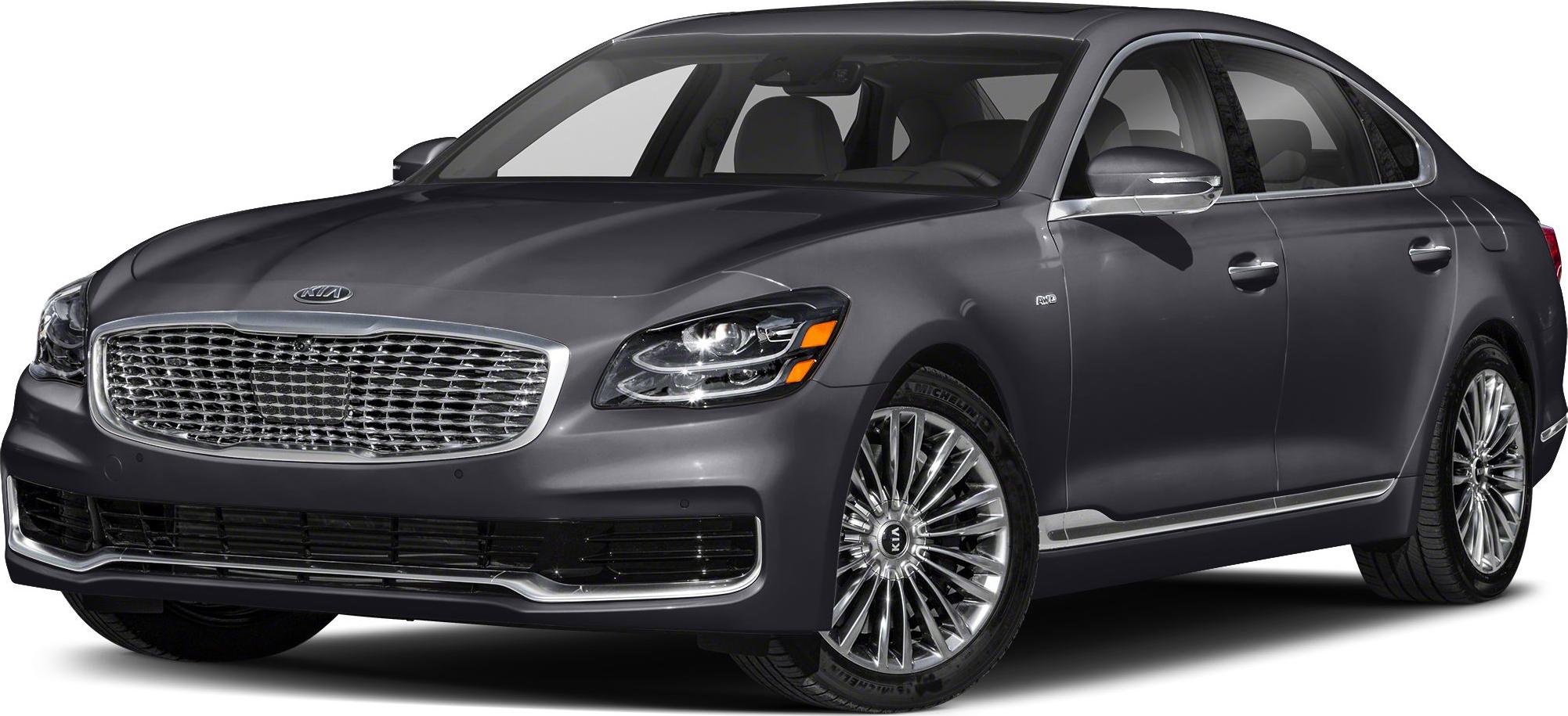 Front grille and headlight design with alloy wheels and chrome accents
