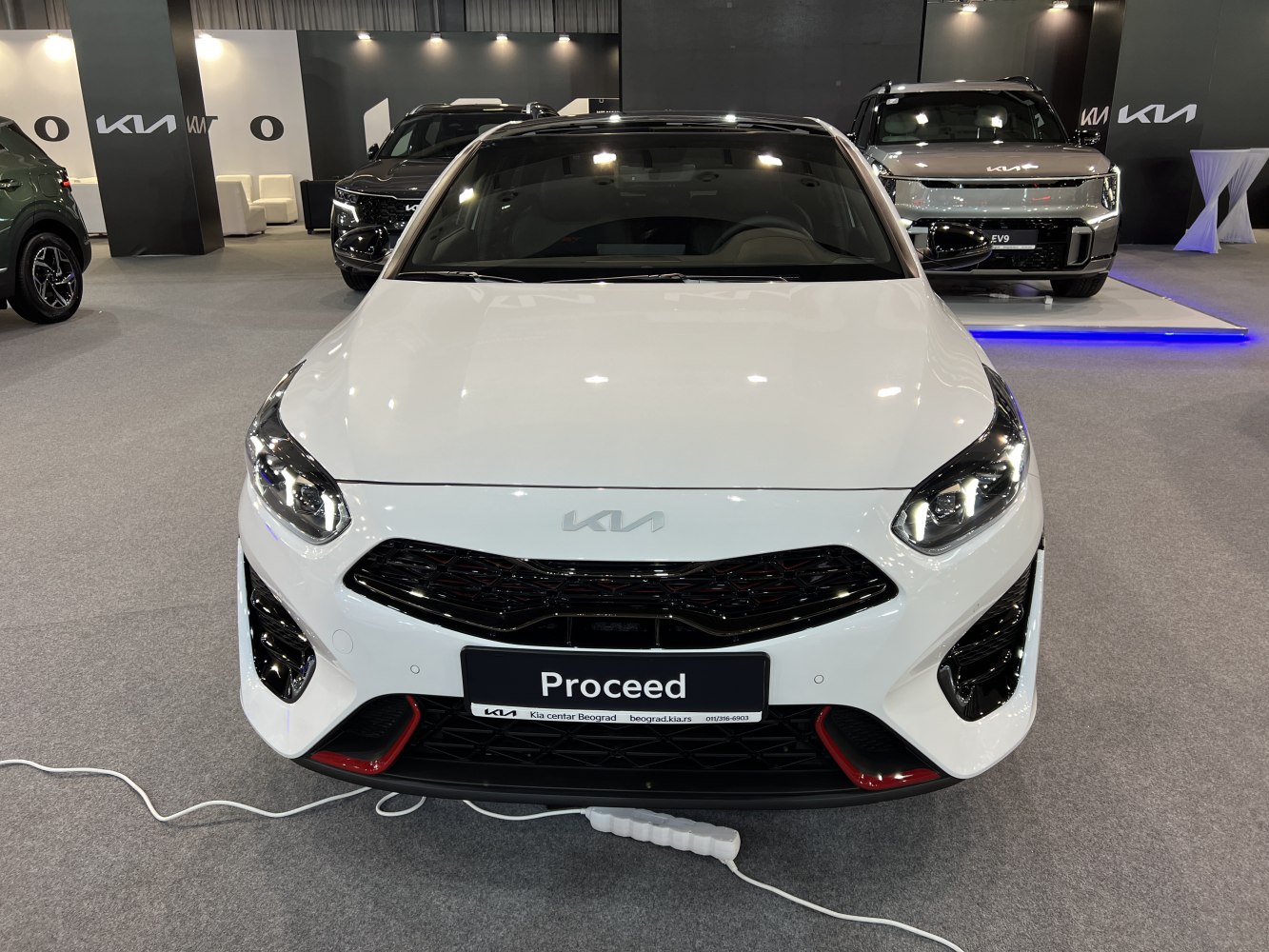 Front view with LED headlights and black grille