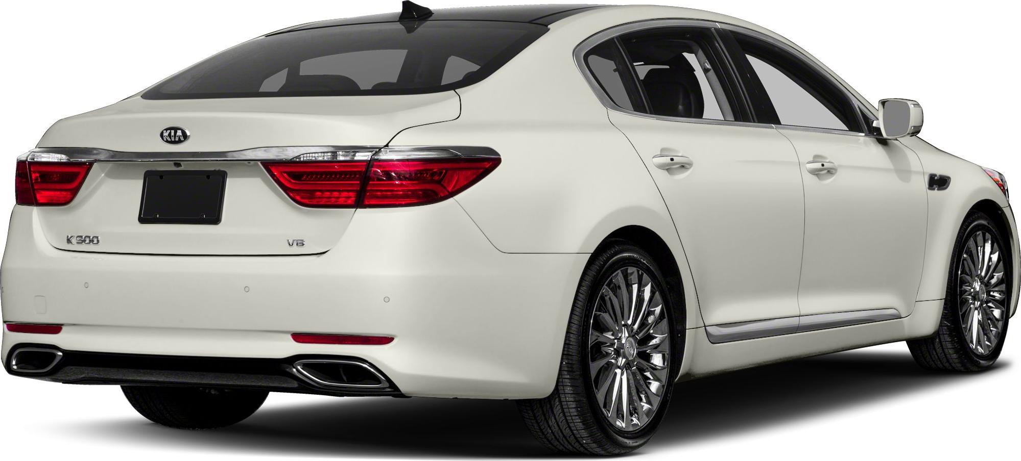 Rear and side view of luxury sedan with chrome trim and V8 badge