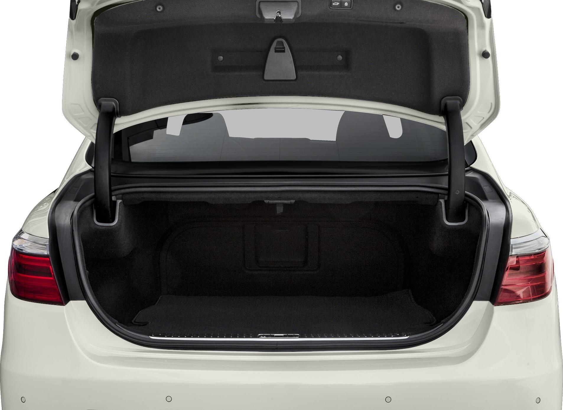 Open trunk and spacious cargo area of a luxury sedan