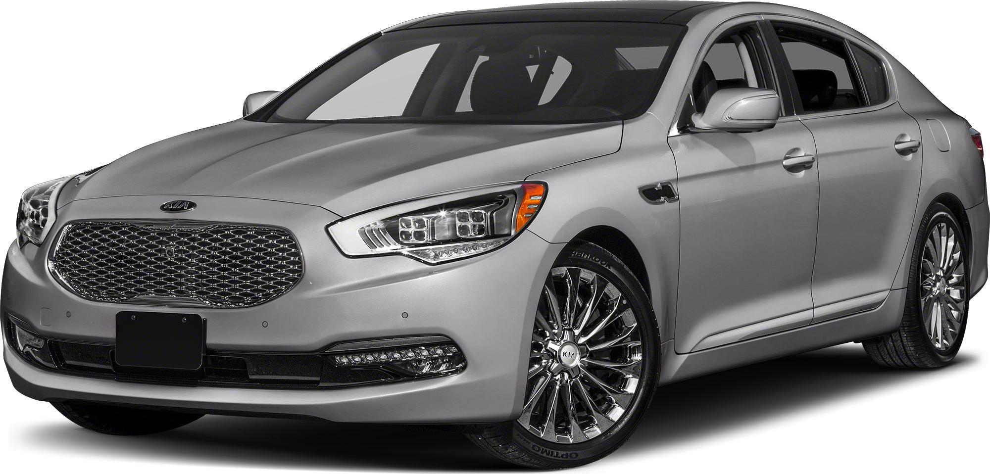 Front-angle view showing grille and chrome multi-spoke wheels